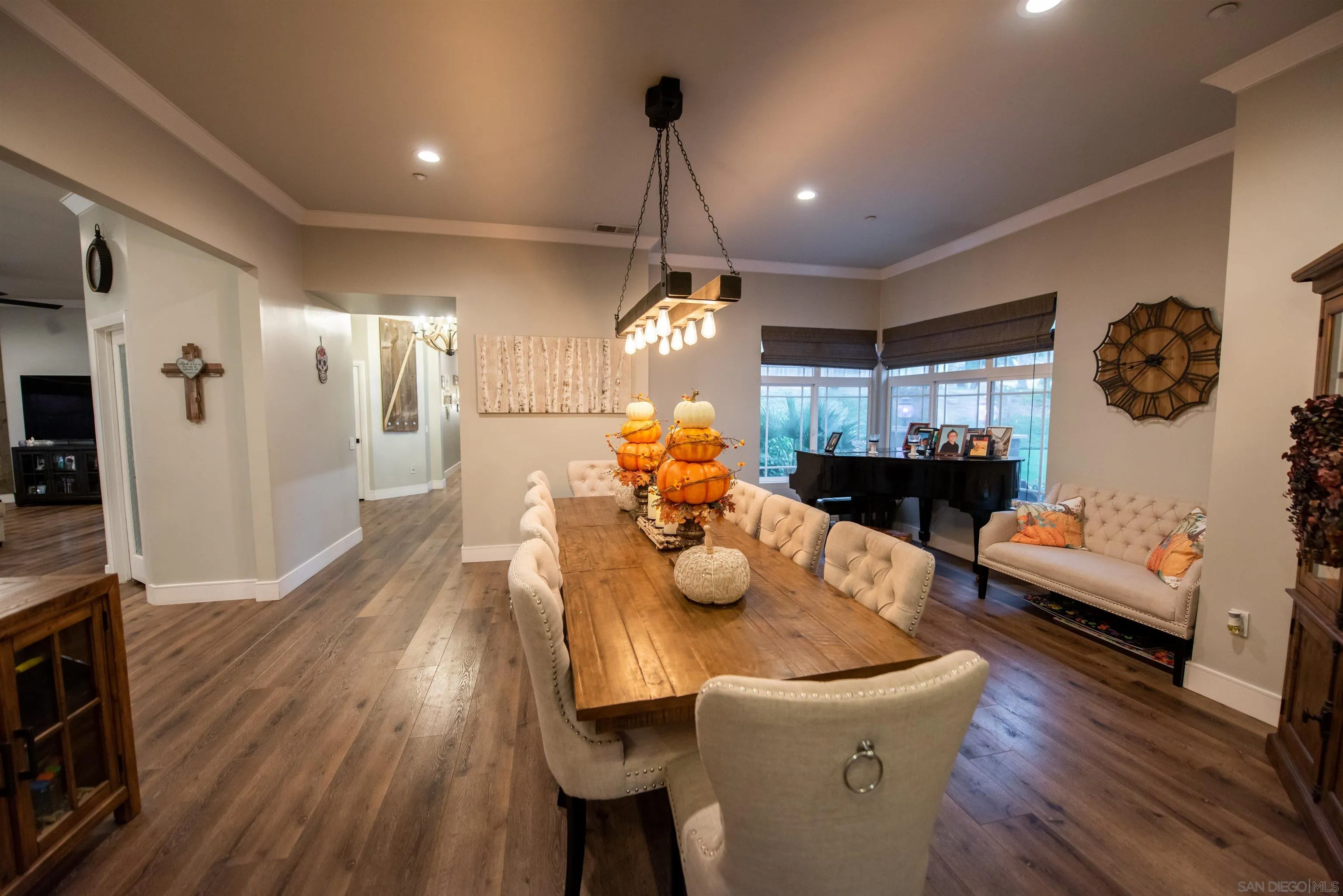 8945 Diamondback Drive Santee, CA 92071 - Photo 33 of 49 a dining room with furniture and wooden floor