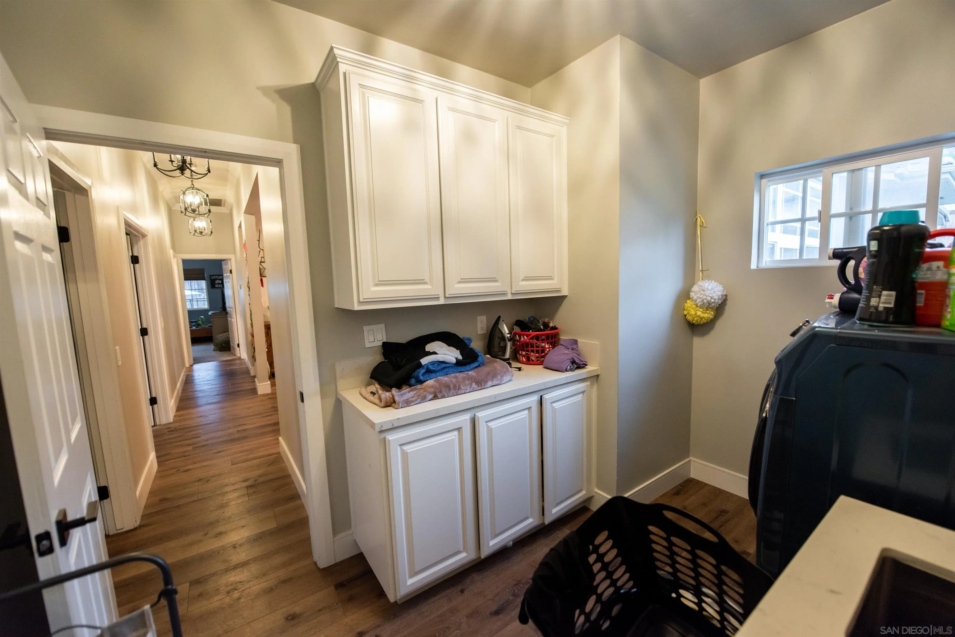 8945 Diamondback Drive Santee, CA 92071 - Photo 35 of 49 a room with wooden floor and furniture