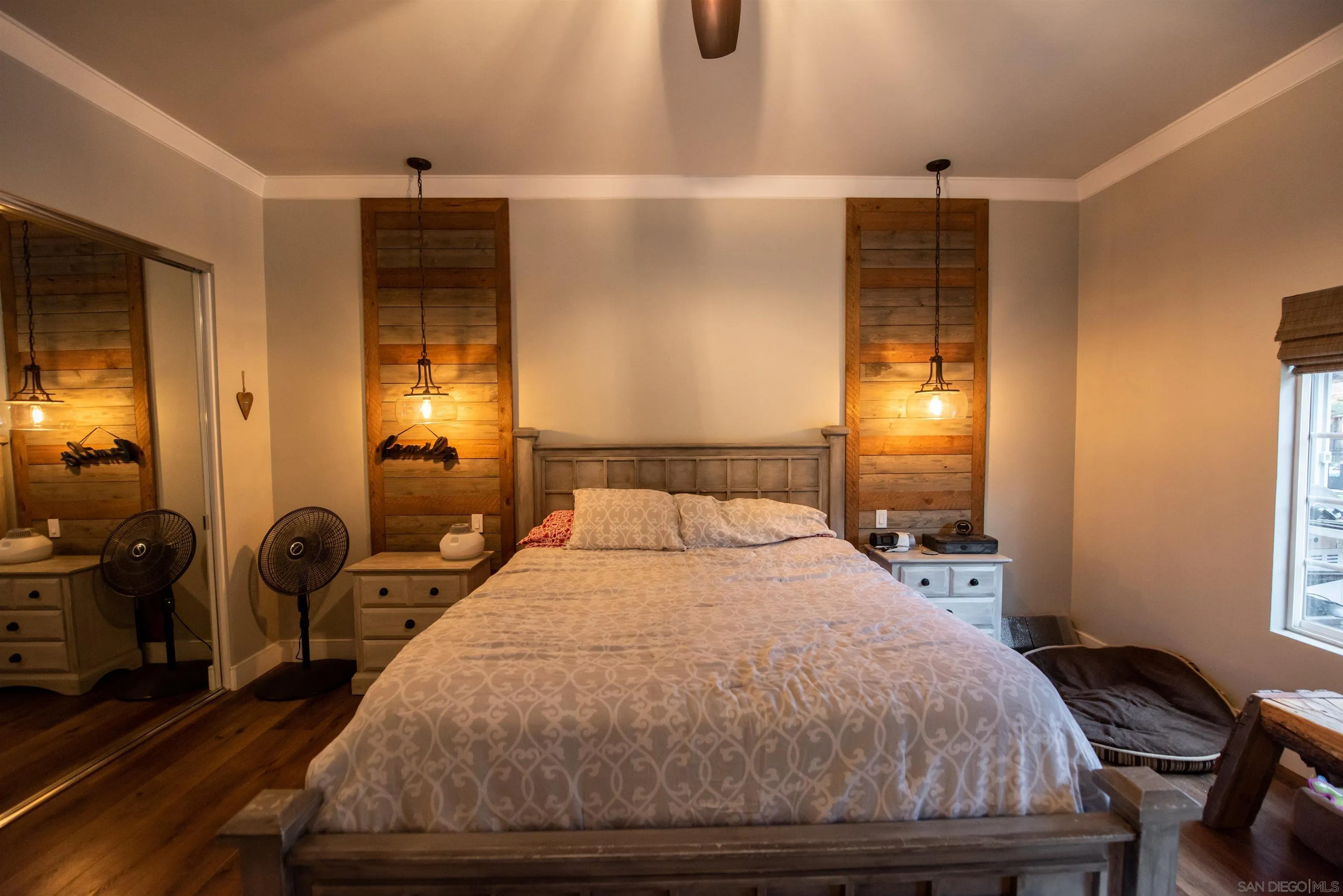8945 Diamondback Drive Santee, CA 92071 - Photo 39 of 49 a bedroom with a bed and wooden floor