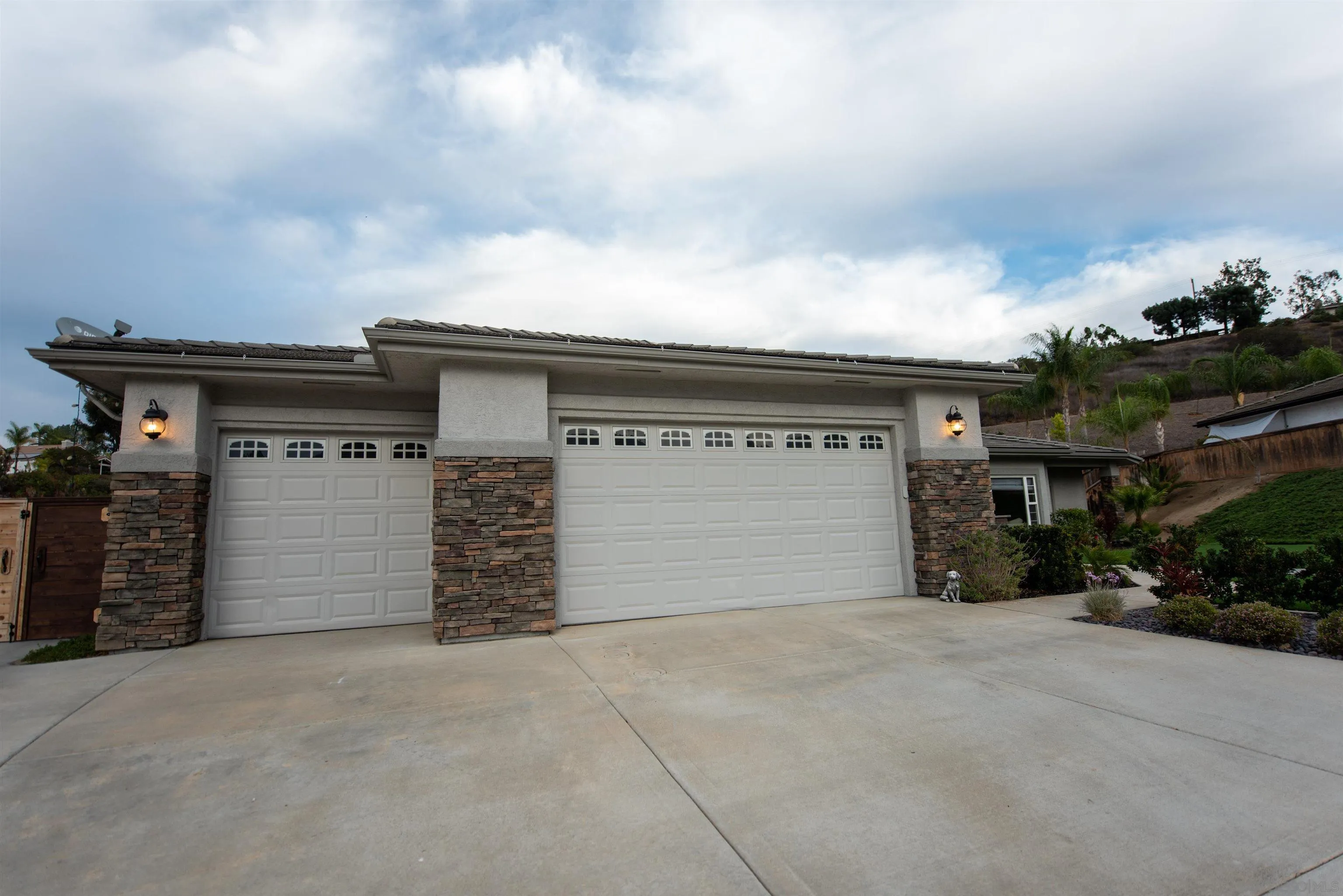 8945 Diamondback Drive Santee, CA 92071 - Photo 4 of 49 an entrance to house with yard and garage