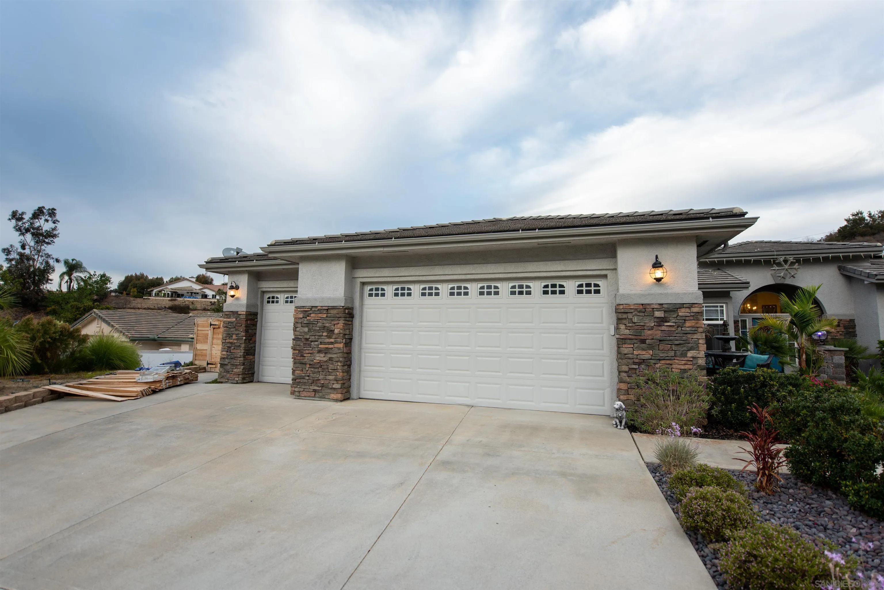 8945 Diamondback Drive Santee, CA 92071 - Photo 6 of 49 a view of a car garage