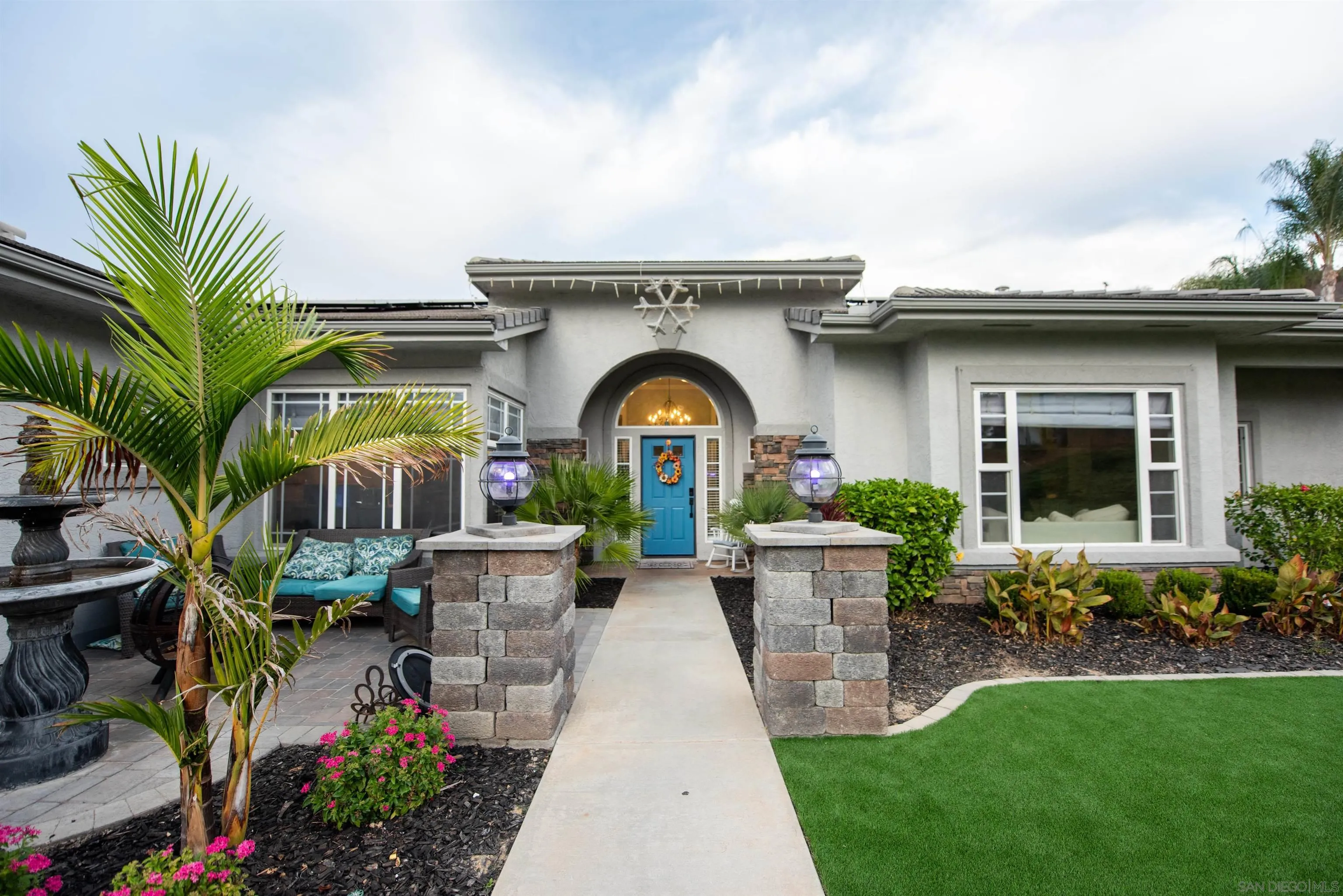 8945 Diamondback Drive Santee, CA 92071 - Photo 9 of 49 a view of a house with garden and plants
