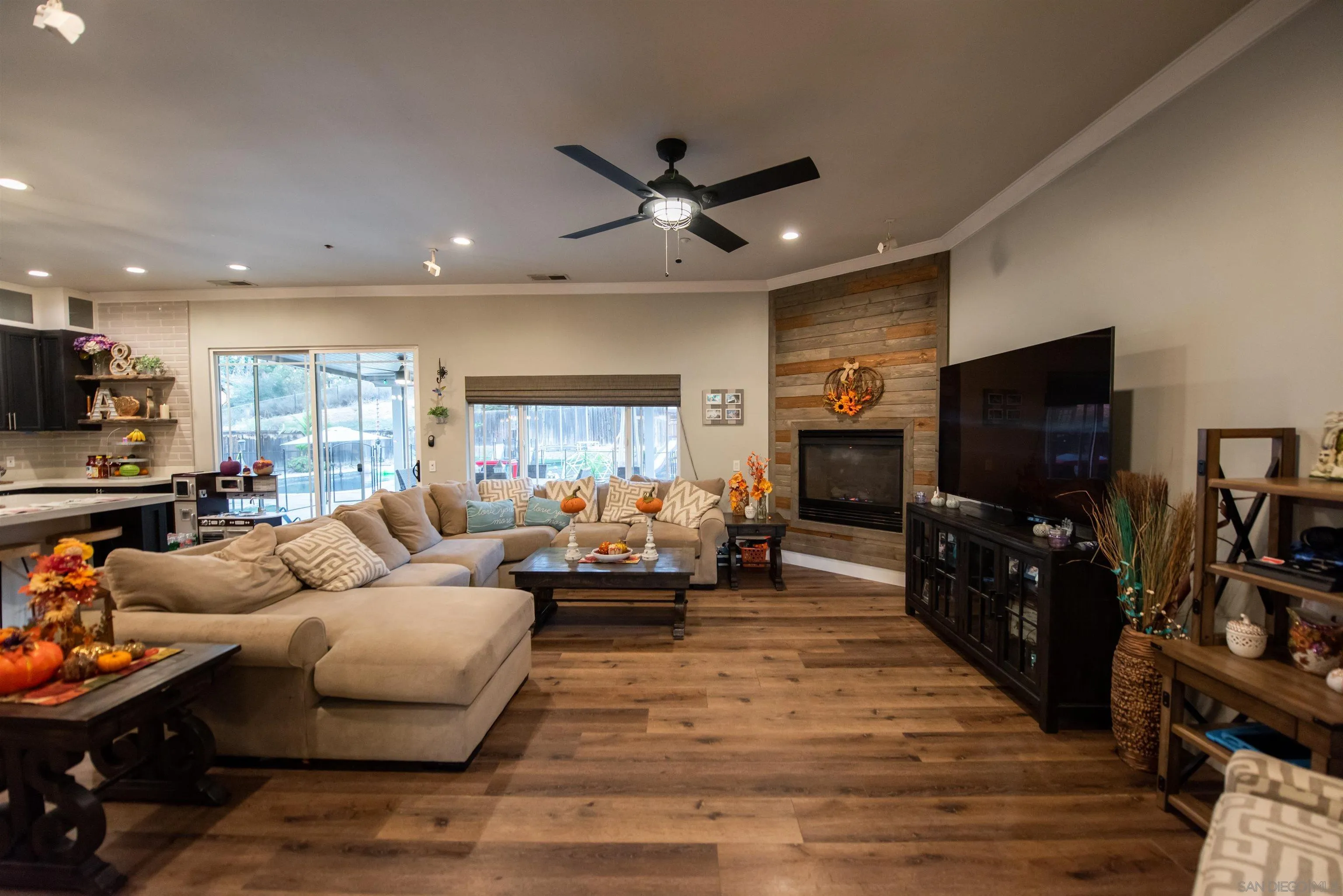 8945 Diamondback Drive Santee, CA 92071 - Photo 10 of 49 a living room with furniture and a flat screen tv