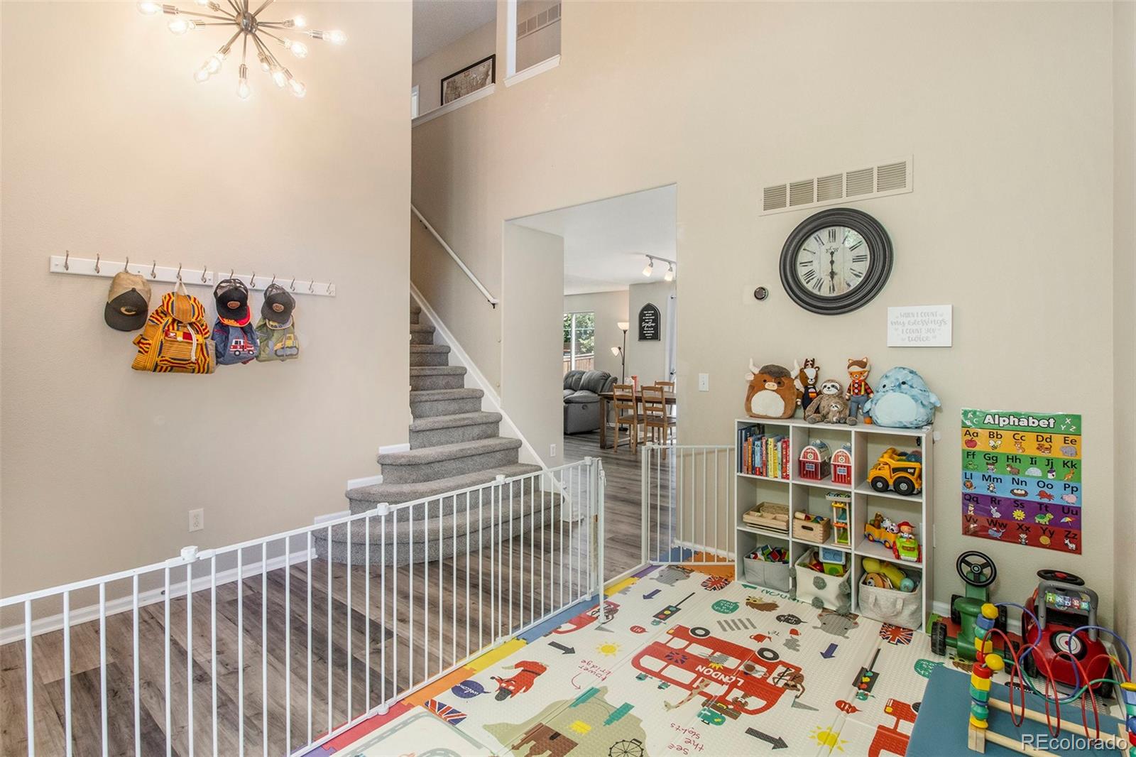 822 Timbervale Trail Highlands Ranch, CO 80129 - Photo 11 of 34 a bedroom with a bed and wooden floor