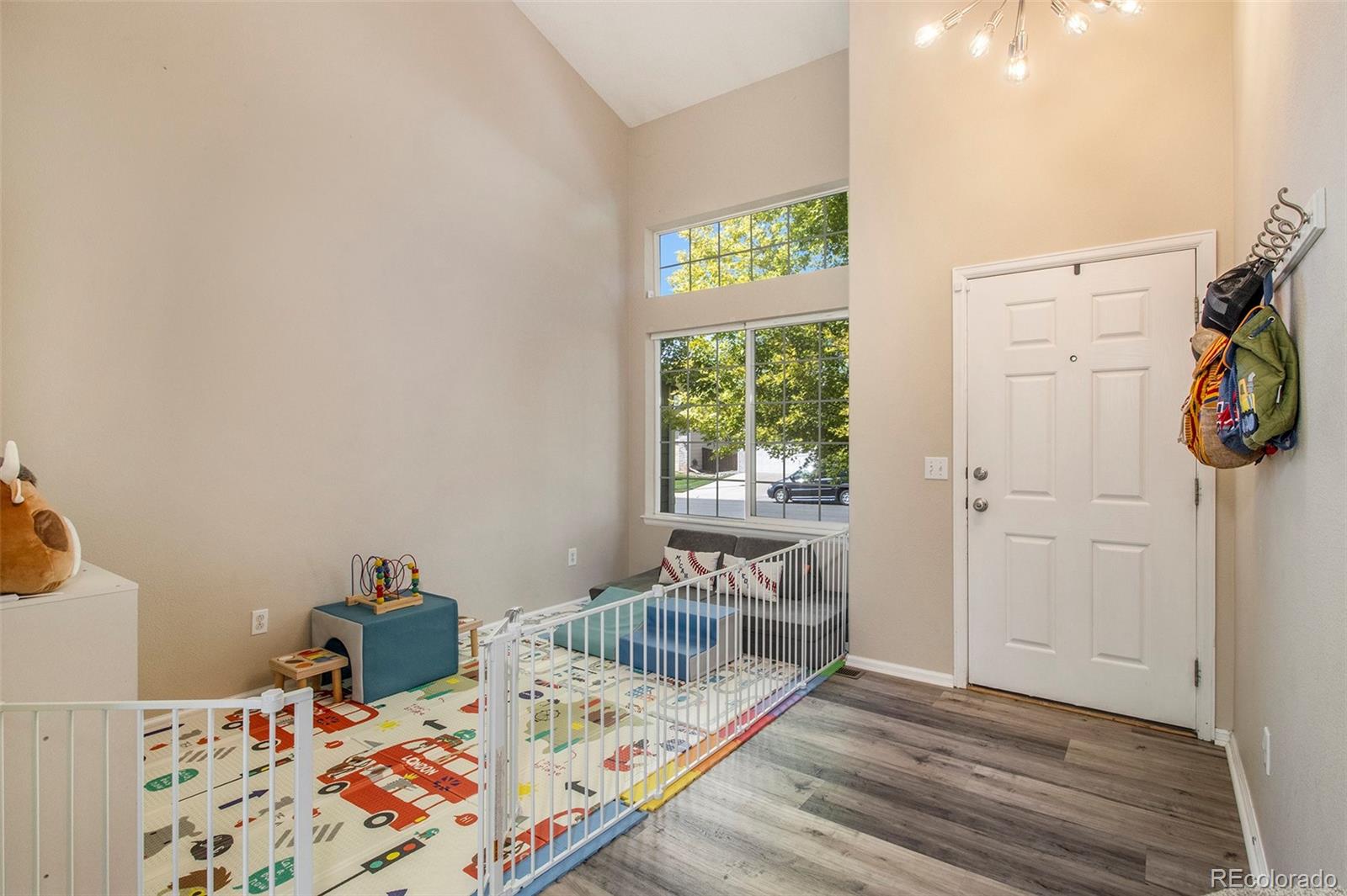822 Timbervale Trail Highlands Ranch, CO 80129 - Photo 12 of 34 kids room with furniture and wooden floor