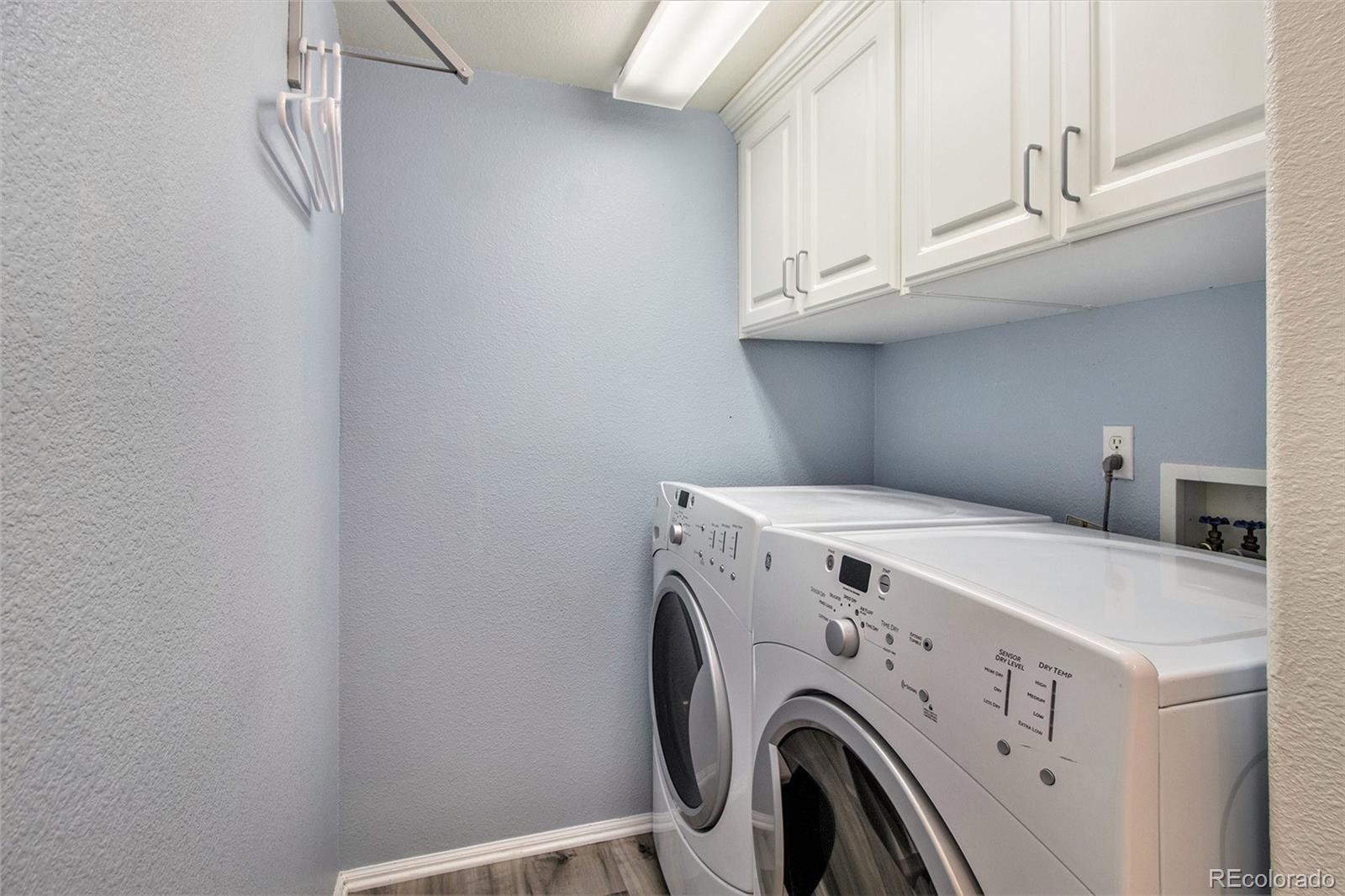 822 Timbervale Trail Highlands Ranch, CO 80129 - Photo 13 of 34 a utility room with dryer and washer