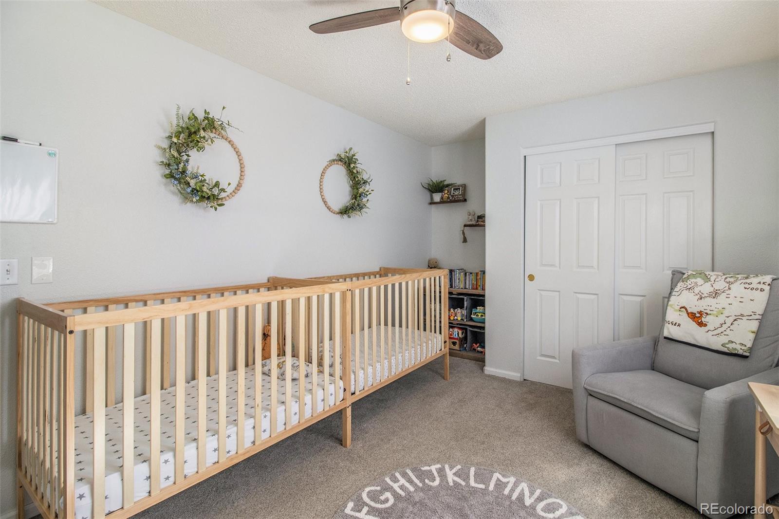 822 Timbervale Trail Highlands Ranch, CO 80129 - Photo 21 of 34 a living room with furniture