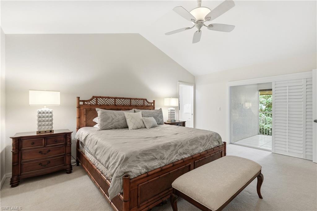 203 Via Perignon, Unit 24 Naples, FL 34119 - Photo 18 of 42 Primary bedroom leading to primary bath and spacious lanai.