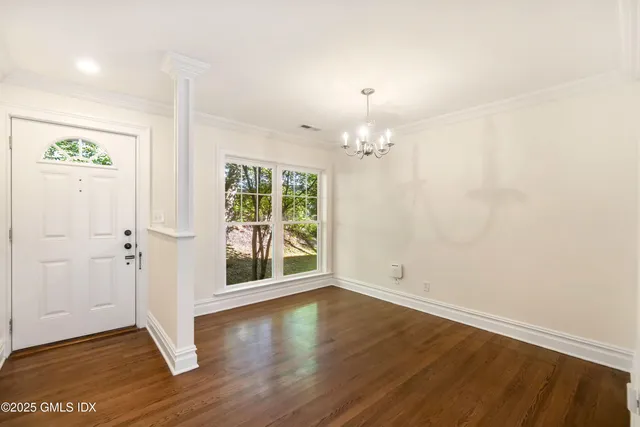 a living room with fireplace furniture and a fireplace