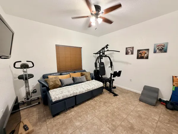 a living room with furniture and a rug