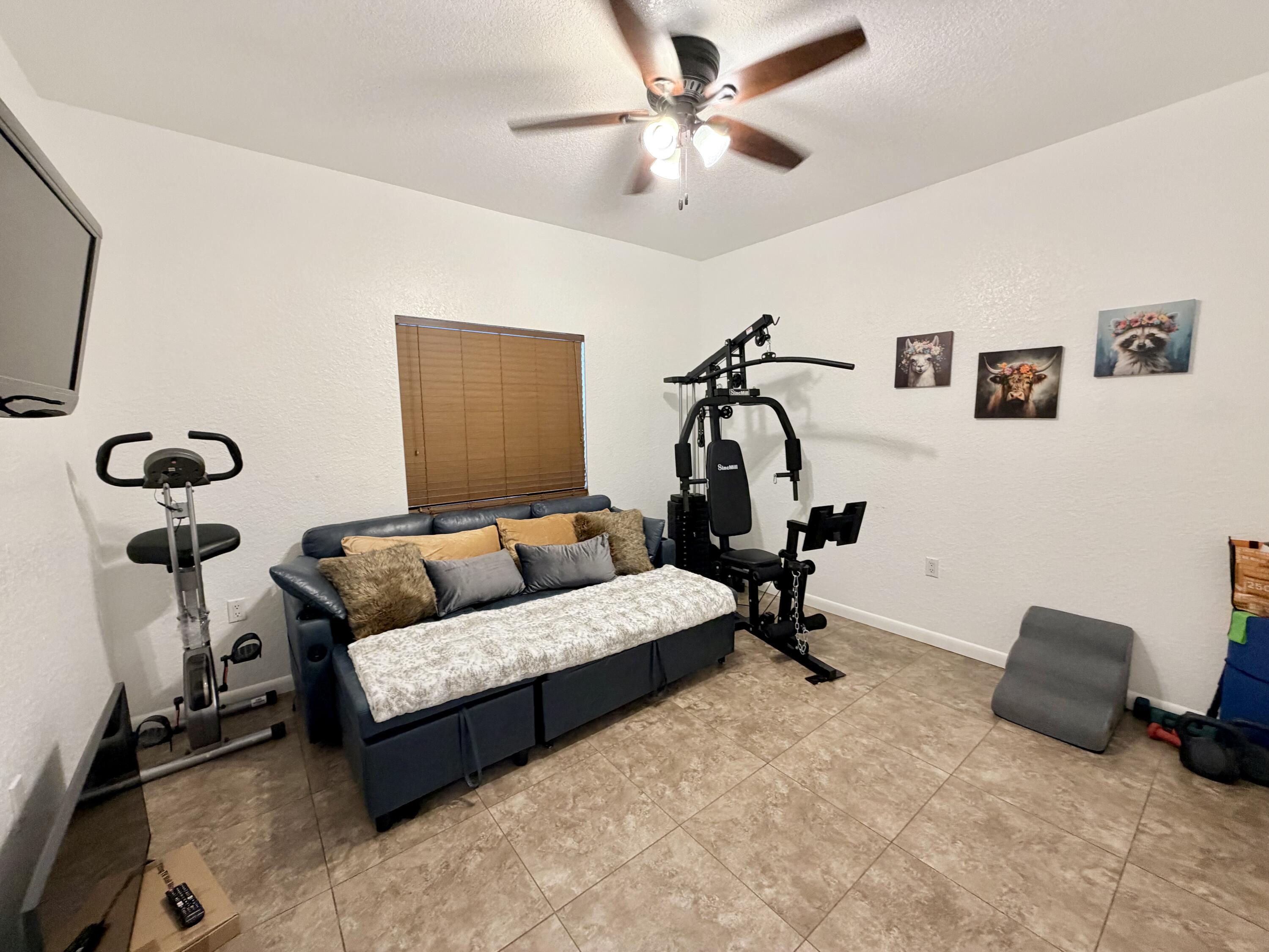 243 Southwest 5th Street Dania Beach, FL 33004 - Photo 8 of 18 a living room with furniture and a rug