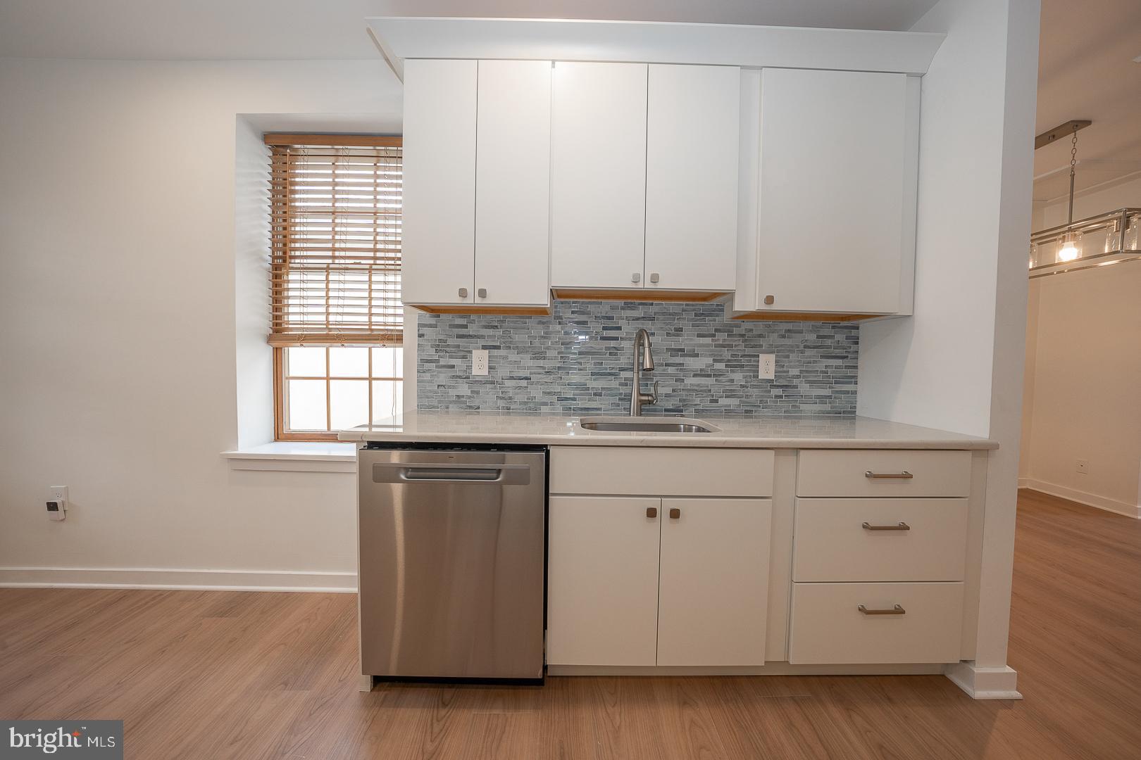 42 North Waterloo Road, Unit 38 Devon, PA 19333 - Photo 6 of 31 Beautiful tile backsplash