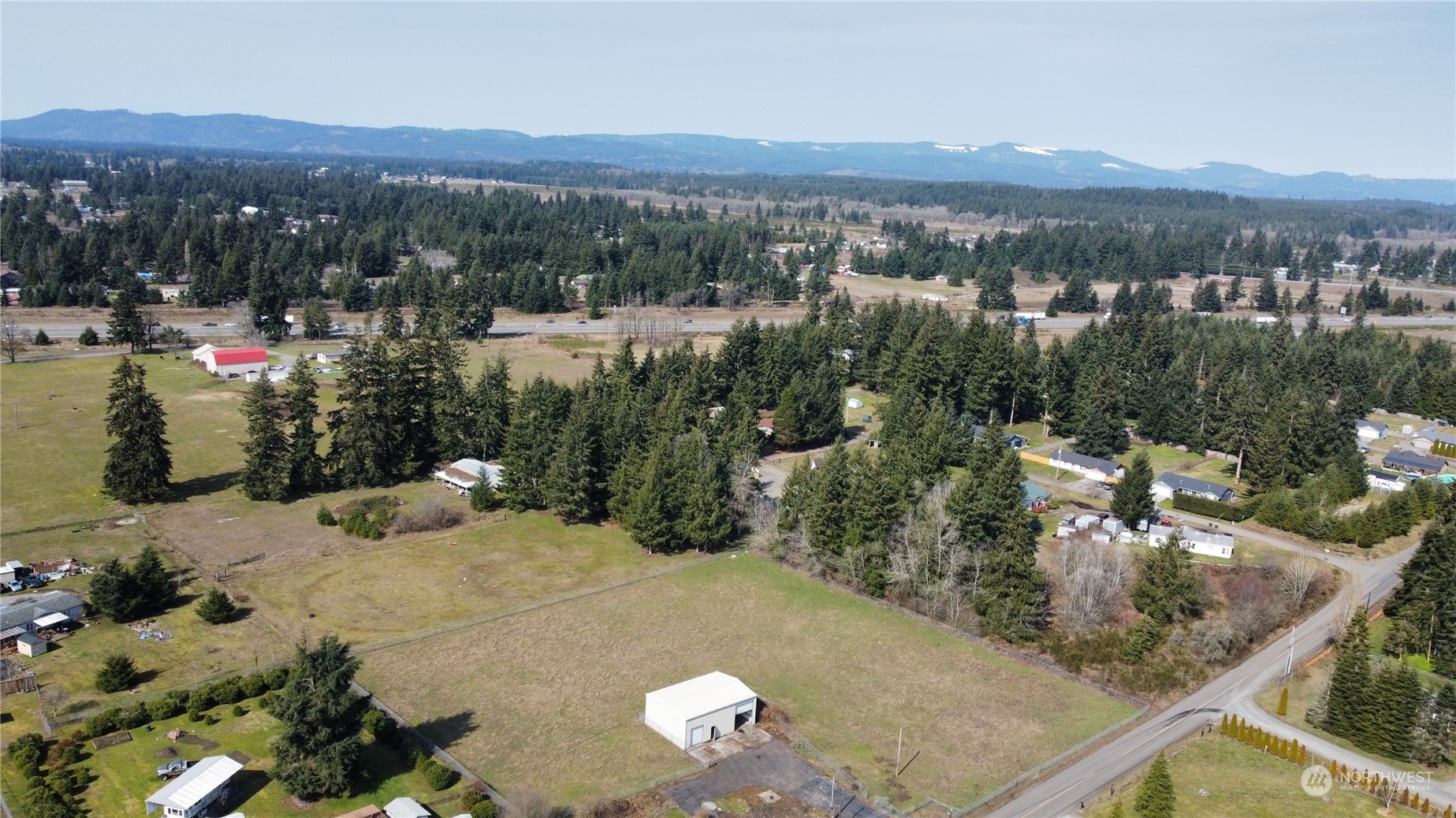 18911 Loganberry Street Southwest Rochester, WA 98579 - Photo 5 of 5 a view of a city from a balcony