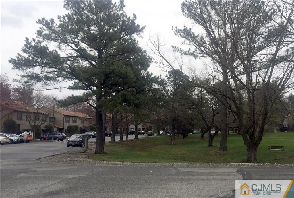 59 Pheasant Run Edison, NJ 08820 - Photo 5 of 6 a view of street with parked cars