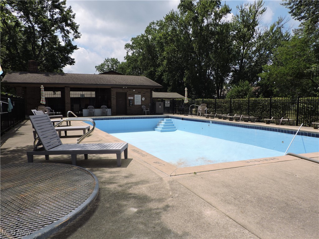 22958 Maple Ridge Road, Unit 205 North Olmsted, OH 44070 - Photo 26 of 28 Community pool with a patio area
