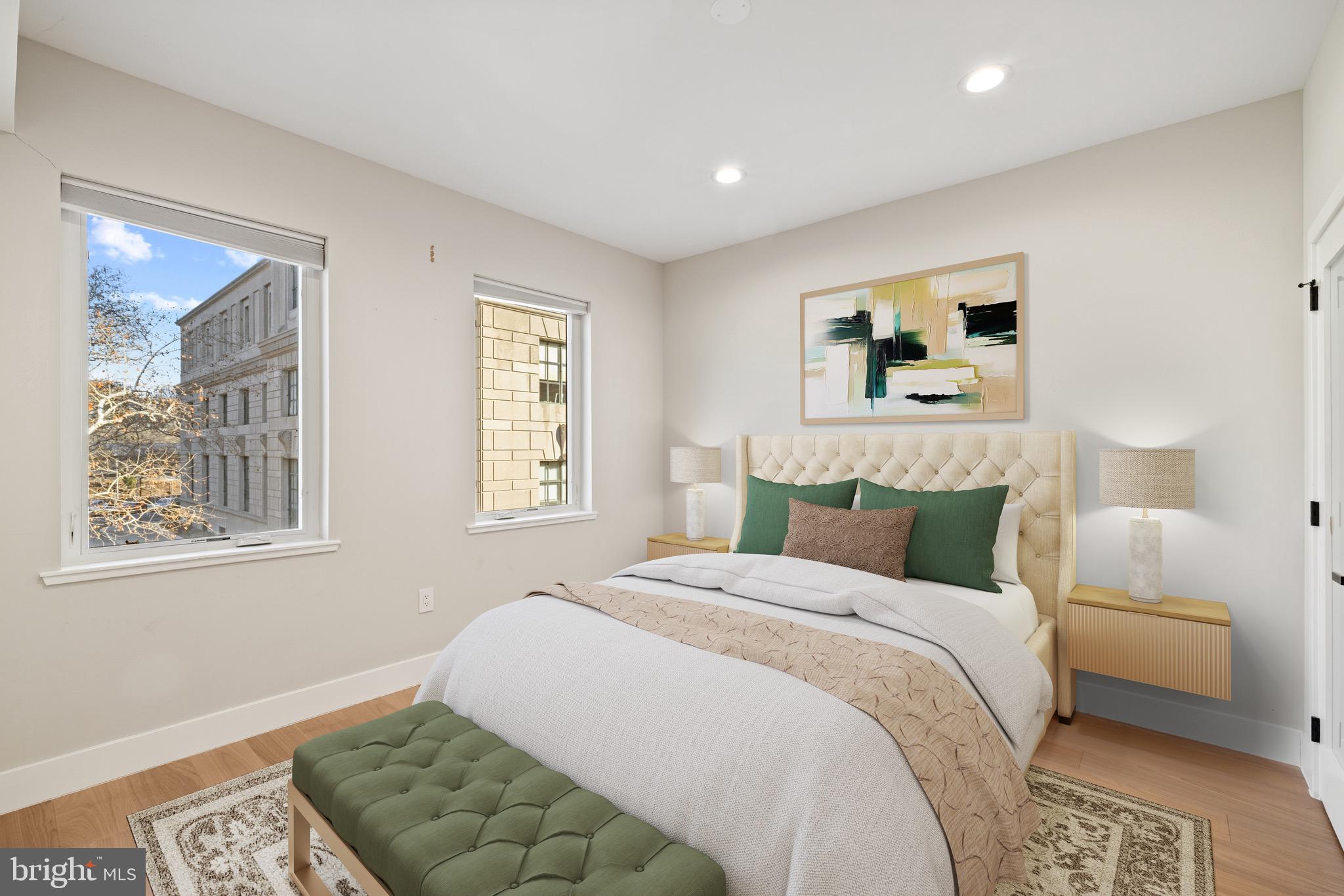 2130 Spring Street Philadelphia, PA 19103 - Photo 17 of 59 a bedroom with bed and a window