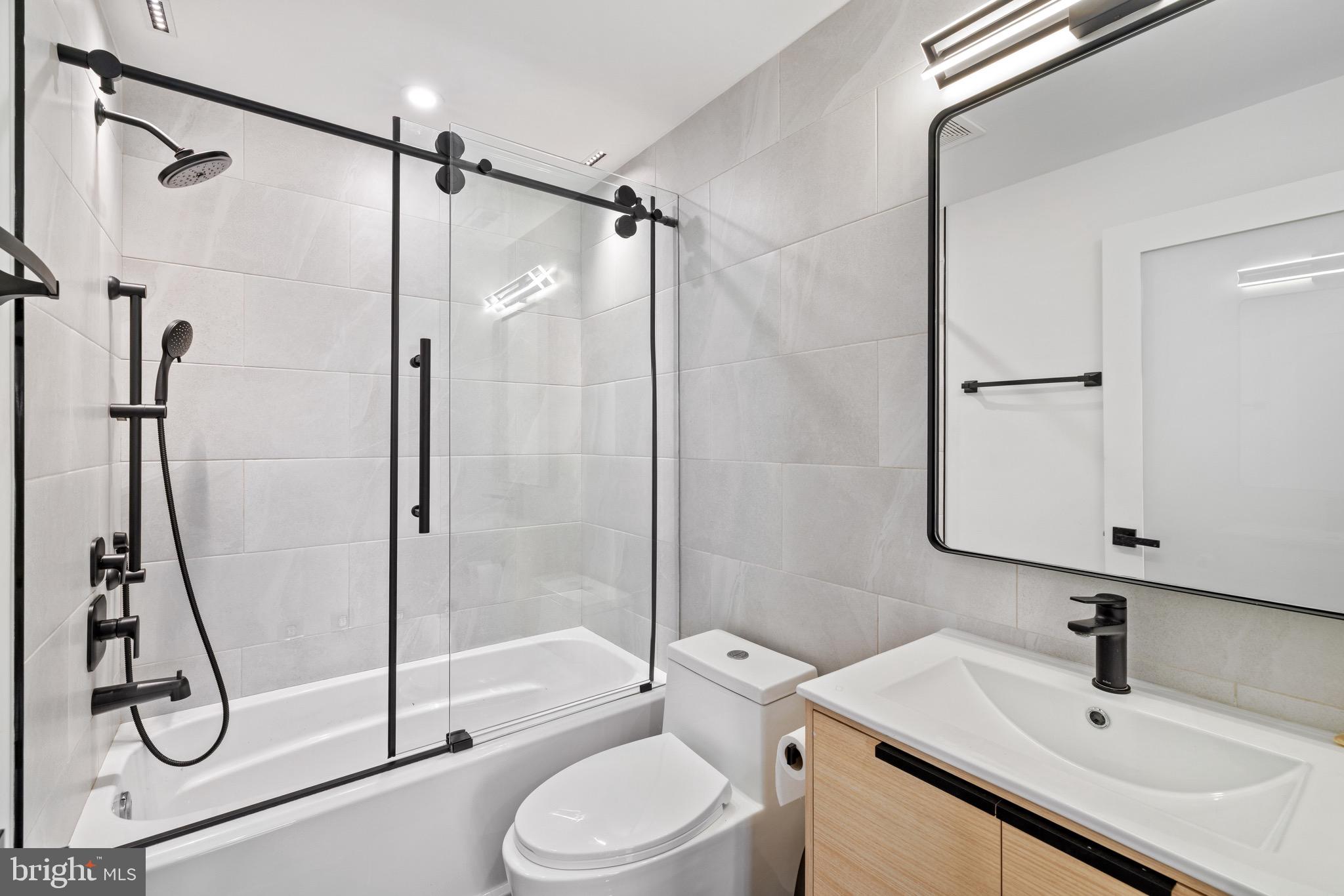 2130 Spring Street Philadelphia, PA 19103 - Photo 20 of 59 a bathroom with a sink toilet and shower