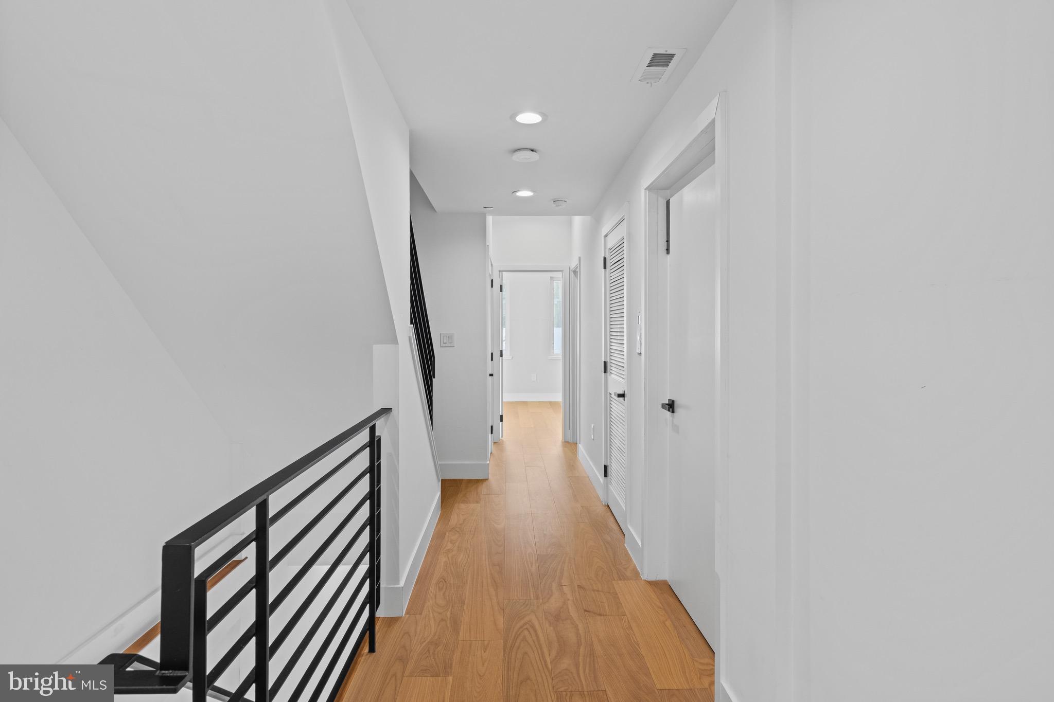 2130 Spring Street Philadelphia, PA 19103 - Photo 21 of 59 a view of a hallway with wooden floor