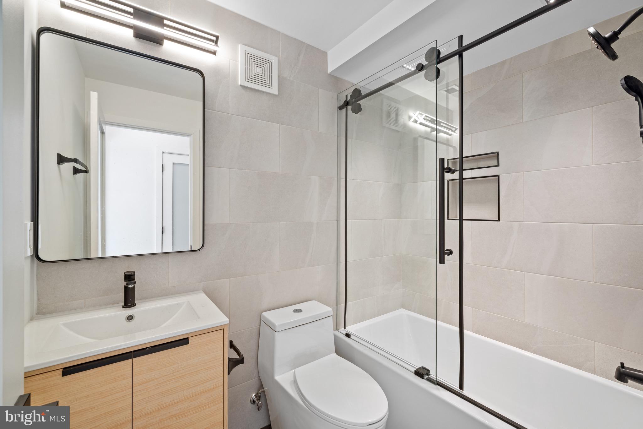 2130 Spring Street Philadelphia, PA 19103 - Photo 24 of 59 a bathroom with a sink toilet and shower