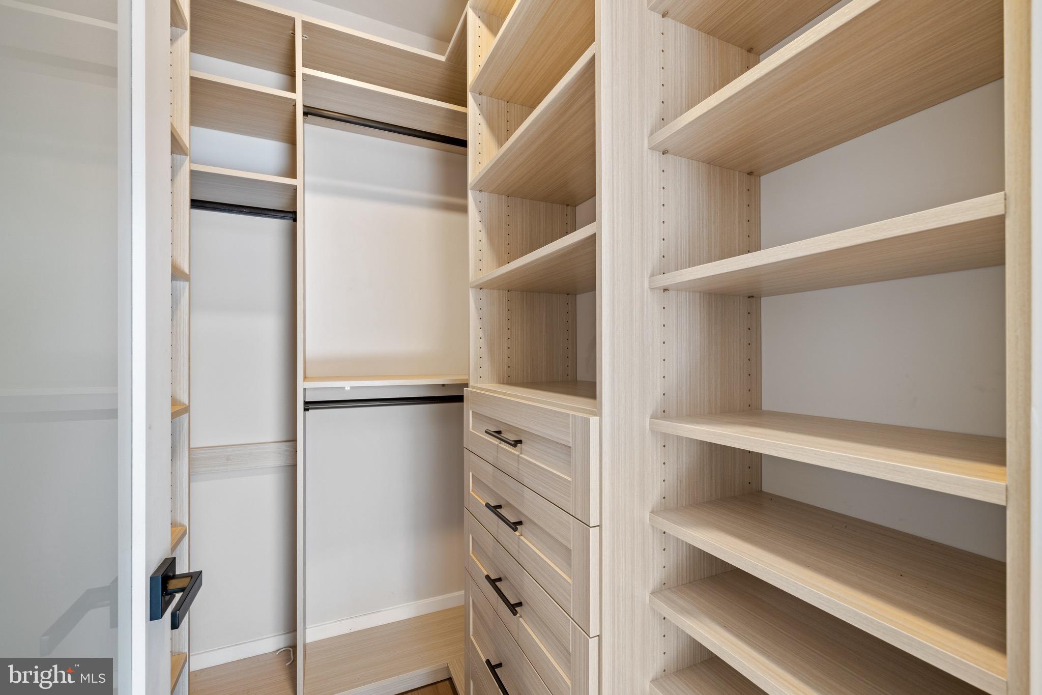 2130 Spring Street Philadelphia, PA 19103 - Photo 28 of 59 a view of walk in closet with empty racks