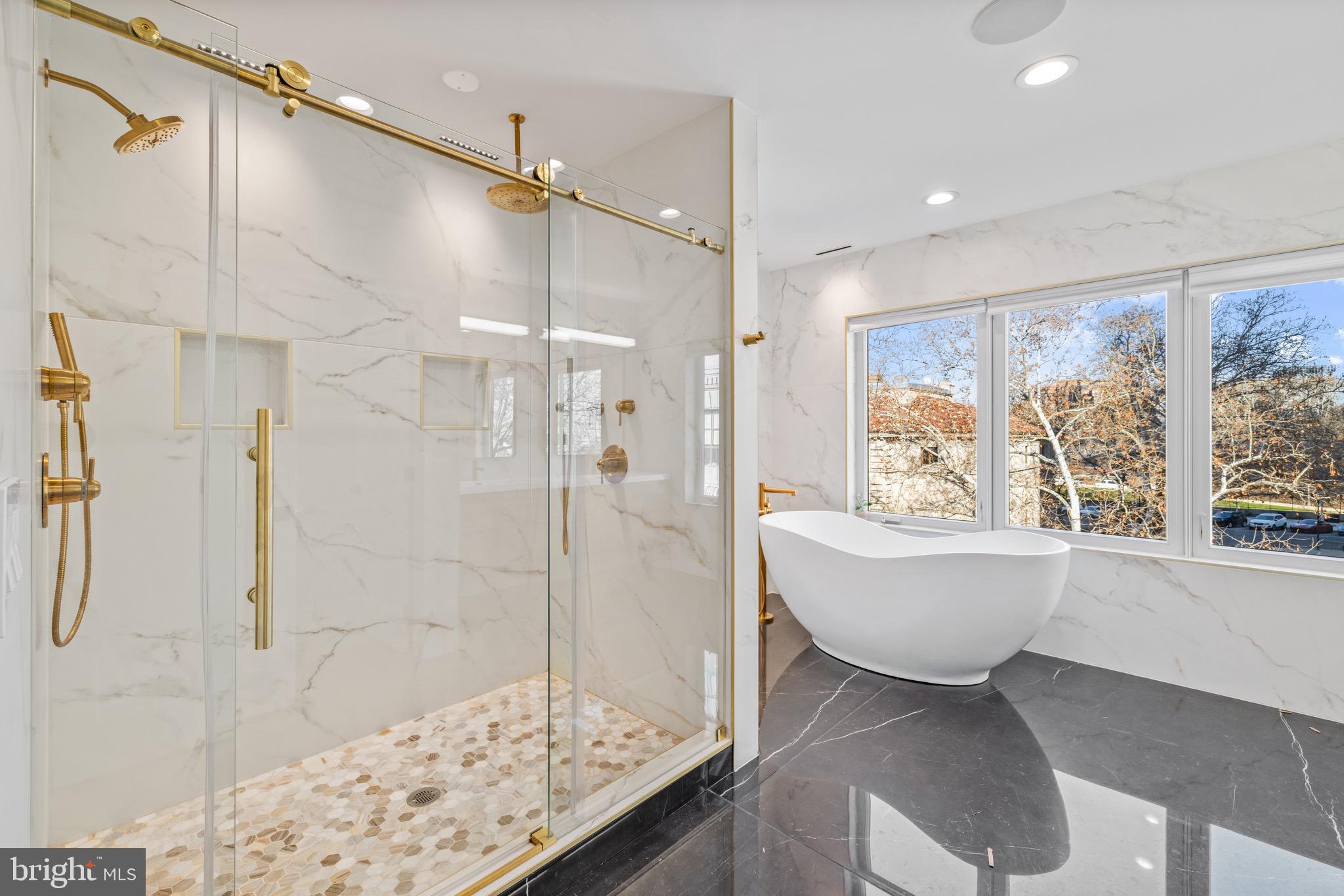 2130 Spring Street Philadelphia, PA 19103 - Photo 33 of 59 a bathroom with a bathtub and shower