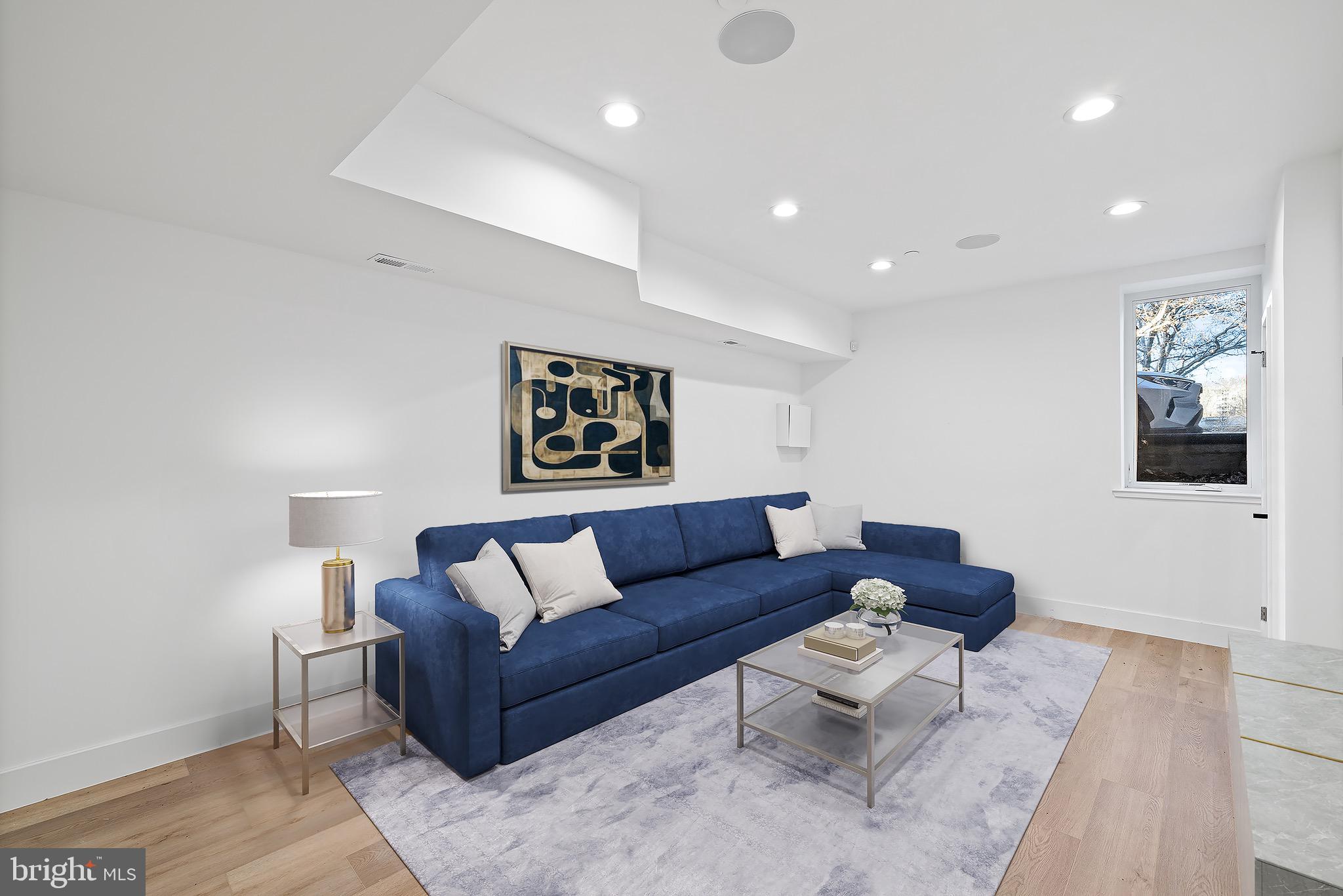 2130 Spring Street Philadelphia, PA 19103 - Photo 40 of 59 a living room with furniture and a couch