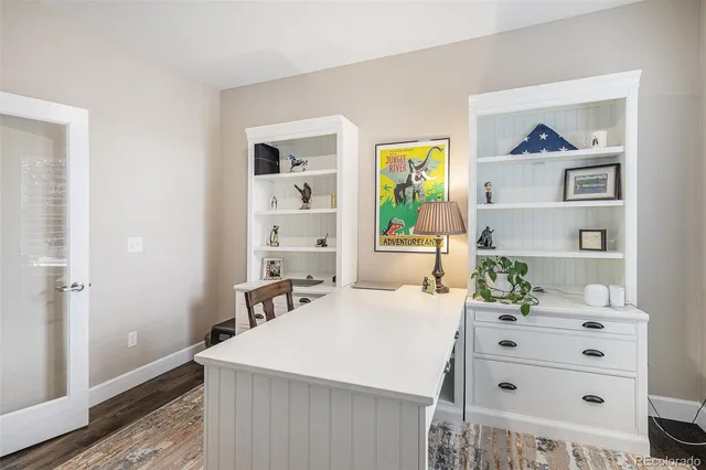 a bed room with a bed and a dresser