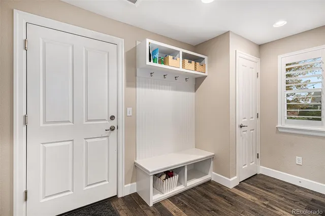 a view of kitchen with furniture and wooden floor