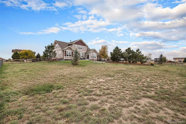 a view of a lake with a big yard