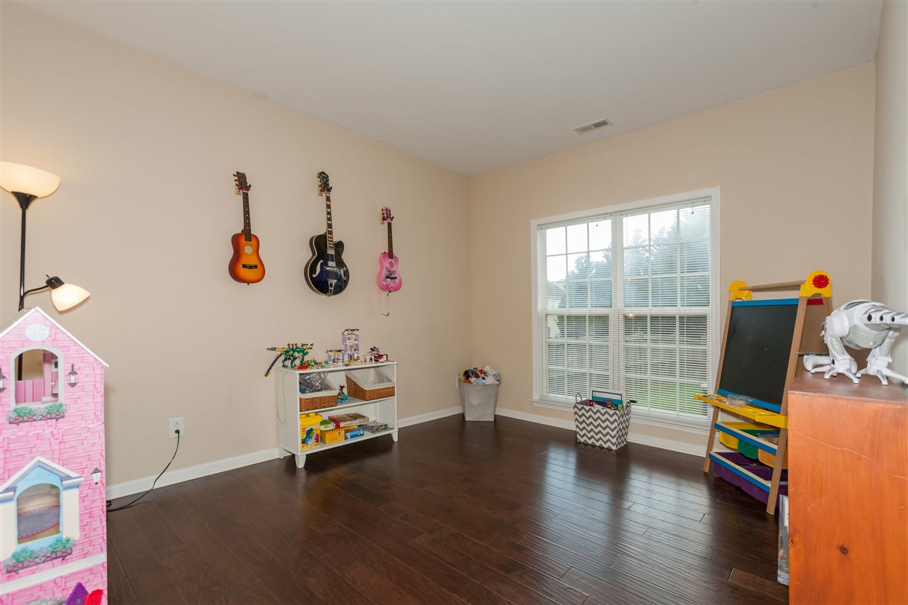 7613 Silver View Lane Raleigh, NC 27613 - Photo 11 of 25 This room is tucked away on the first floor and features double french doors. You can use as these owners have as a first floor playroom or use it as a hobby room, office, game room, fitness room, music room, etc. Flex