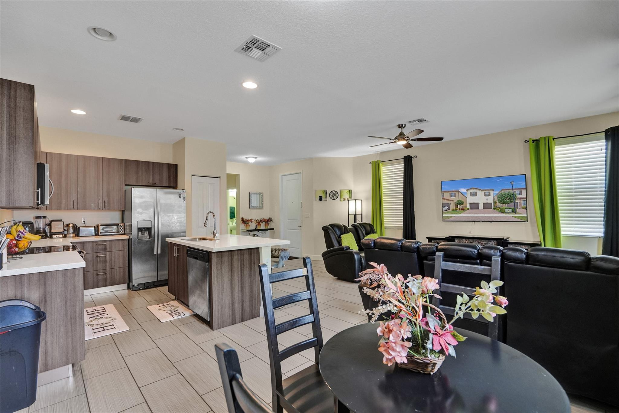 4875 Northwest 55th Place Tamarac, FL 33319 - Photo 15 of 44 a living room with furniture and a window