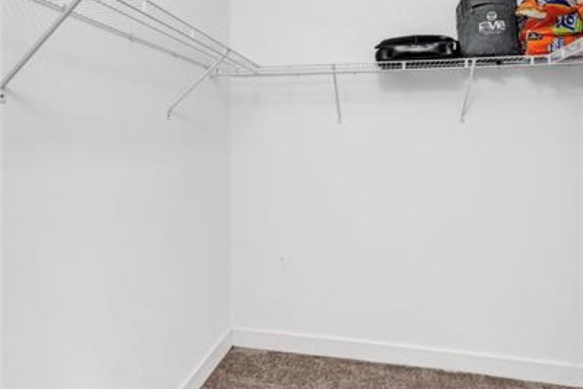 4875 Northwest 55th Place Tamarac, FL 33319 - Photo 28 of 44 a view of small space with racks on the wall