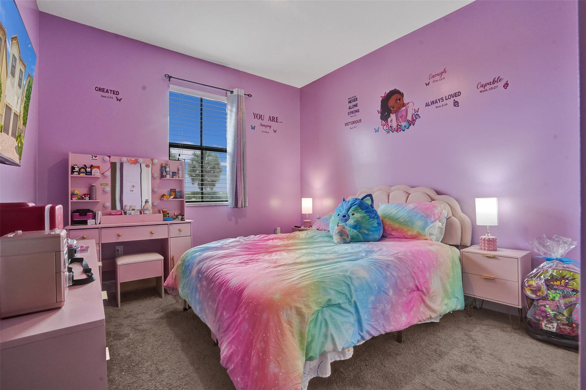 4875 Northwest 55th Place Tamarac, FL 33319 - Photo 30 of 44 a bedroom with a bed and a table