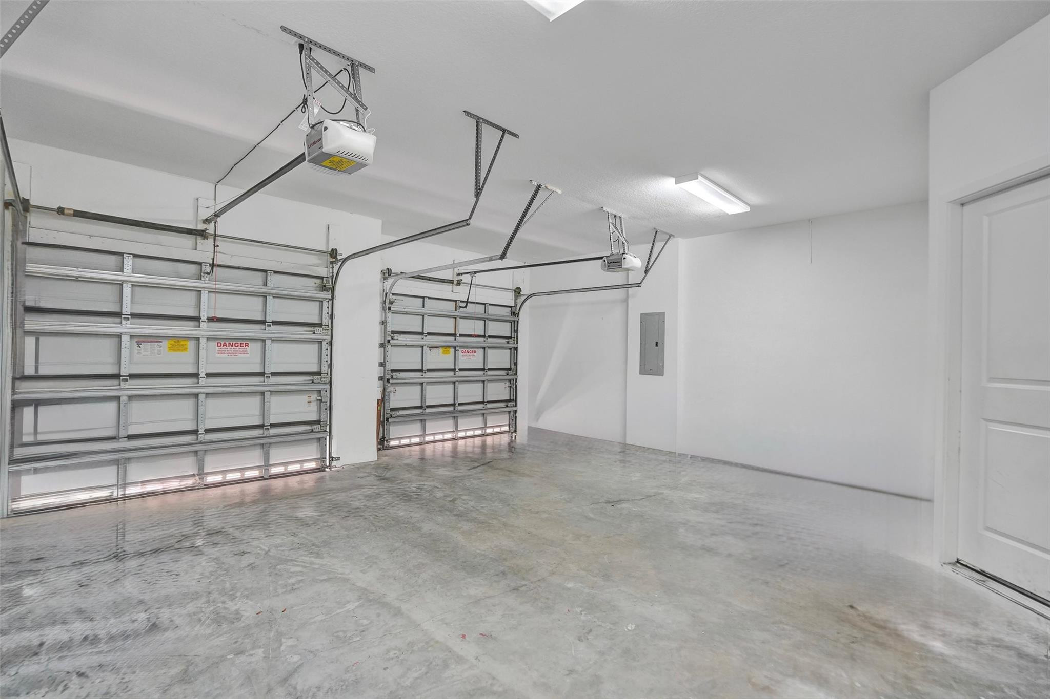 4875 Northwest 55th Place Tamarac, FL 33319 - Photo 36 of 44 a view of an empty room with windows