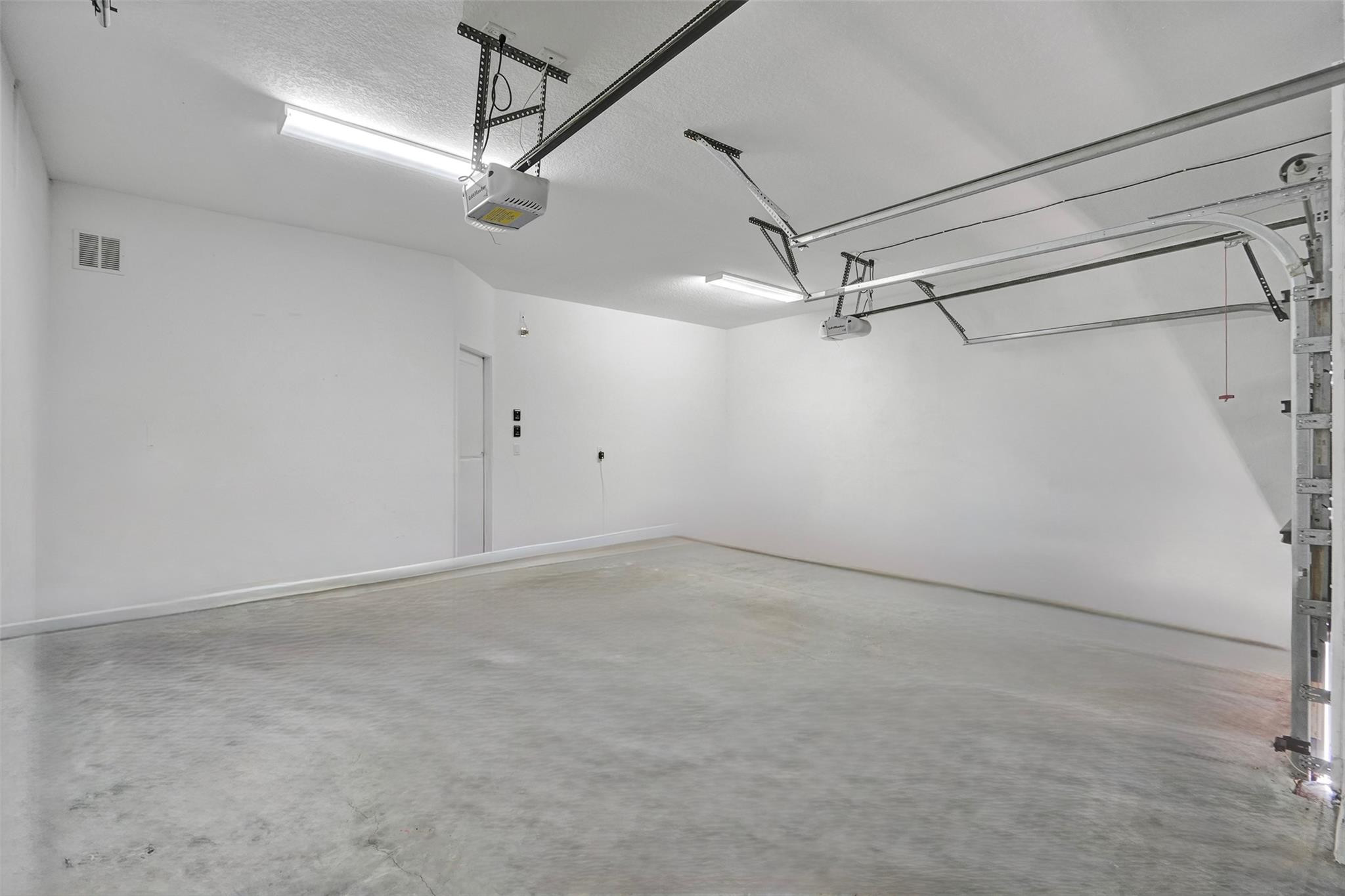 4875 Northwest 55th Place Tamarac, FL 33319 - Photo 37 of 44 a view of a room with racks on the wall