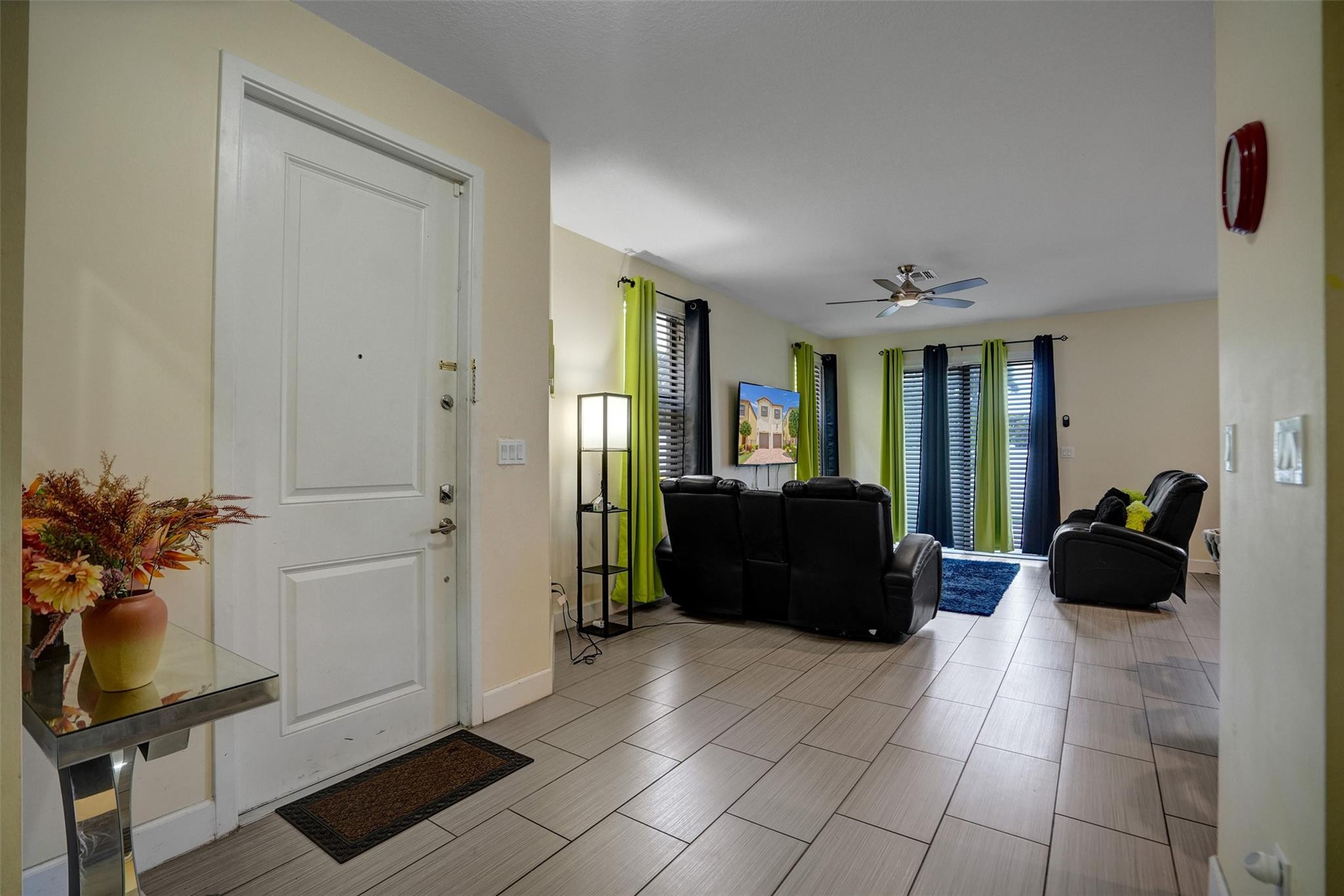 4875 Northwest 55th Place Tamarac, FL 33319 - Photo 9 of 44 a living room with furniture and a window
