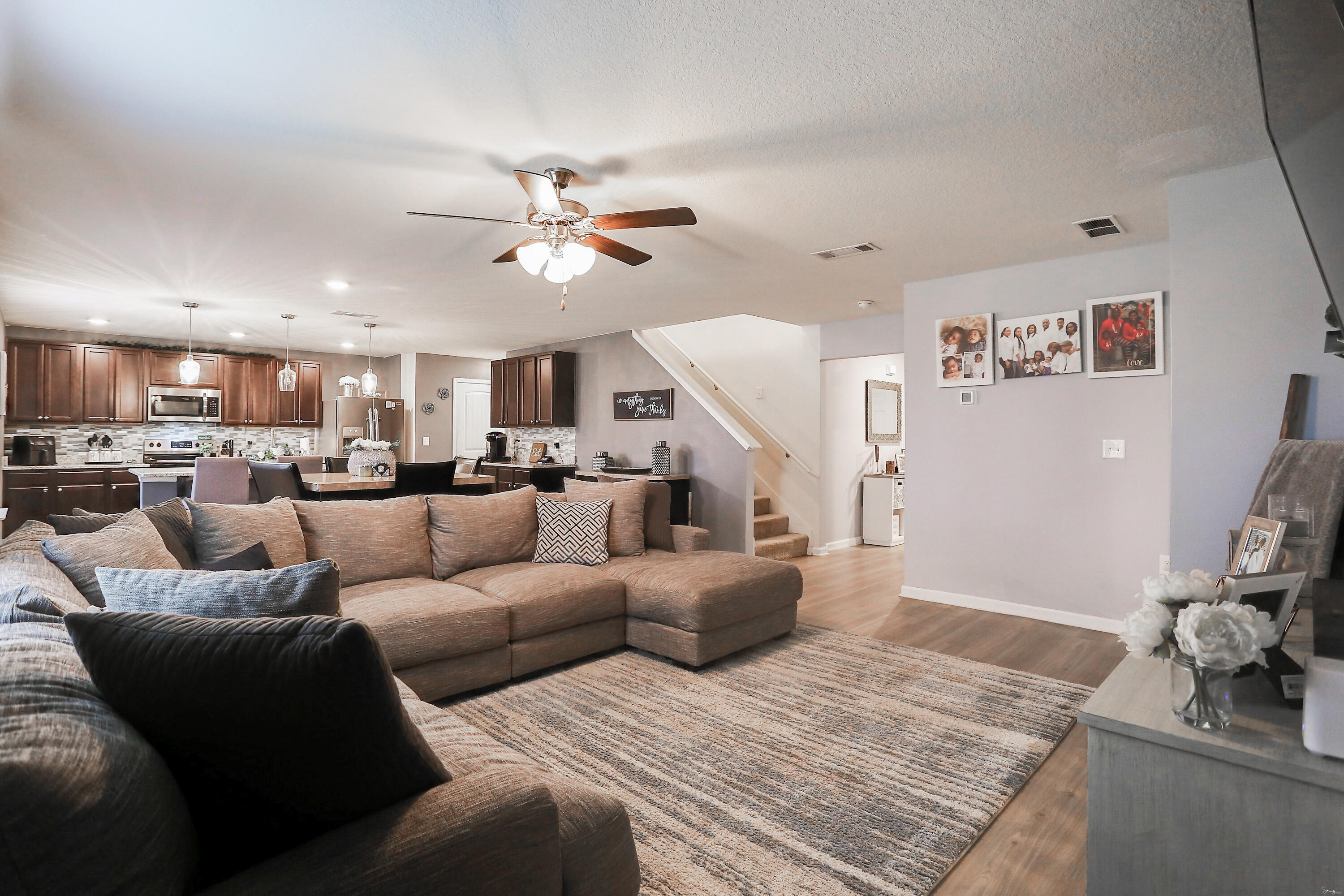 358 Merlin Court Crestview, FL 32539 - Photo 12 of 45 a living room with furniture and a view of kitchen