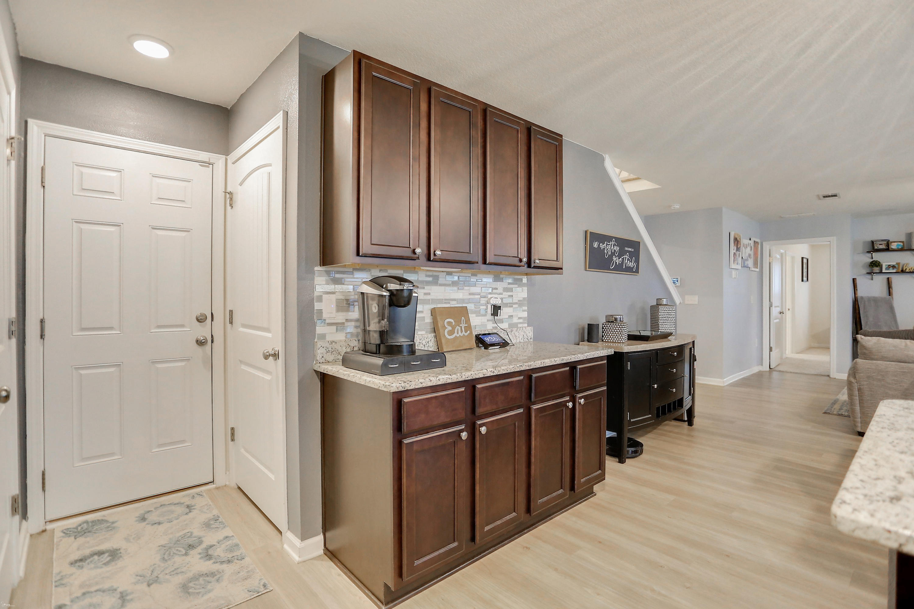 358 Merlin Court Crestview, FL 32539 - Photo 21 of 45 a kitchen with stainless steel appliances granite countertop a refrigerator and a stove top oven