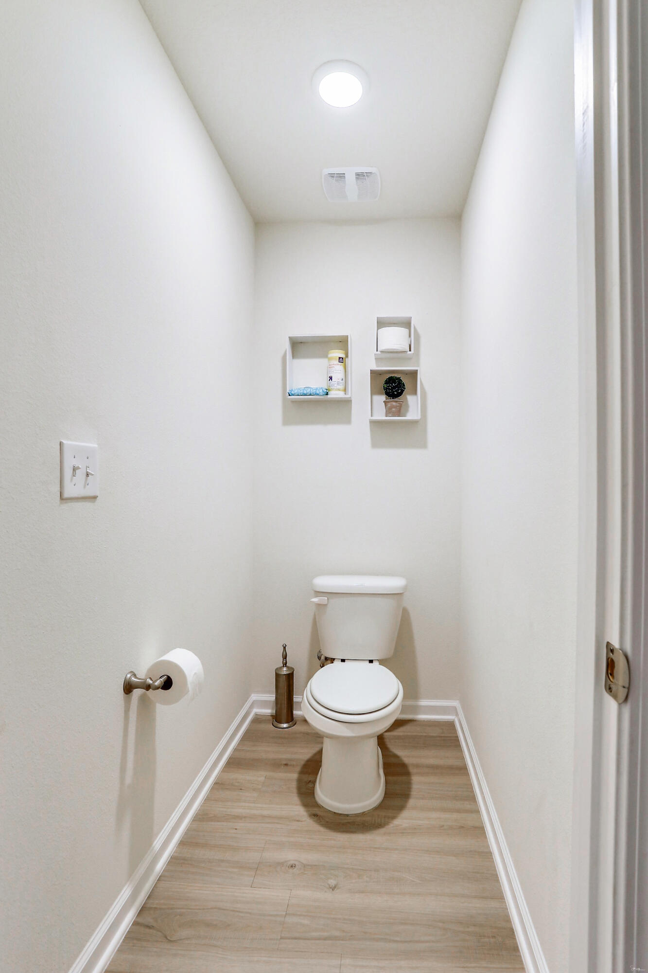 358 Merlin Court Crestview, FL 32539 - Photo 26 of 45 a bathroom with a toilet and a mirror