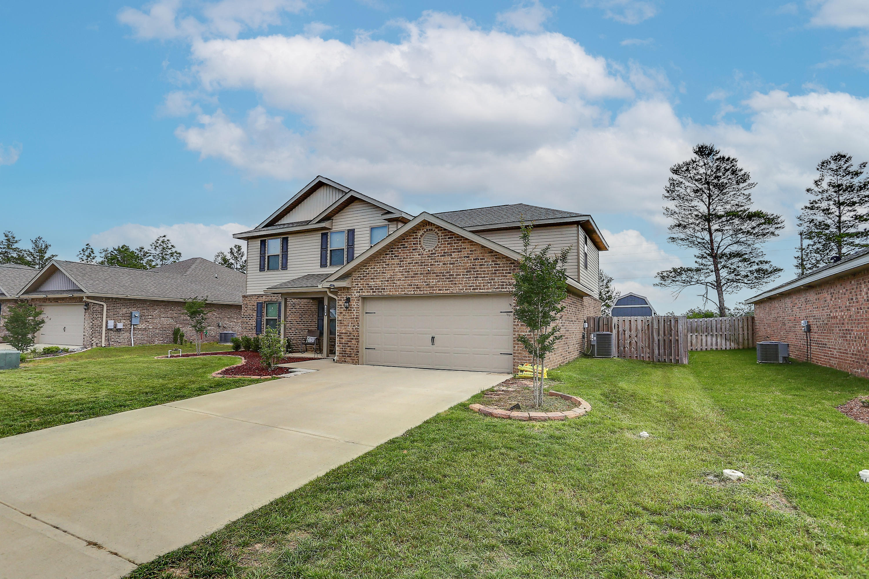 358 Merlin Court Crestview, FL 32539 - Photo 3 of 45 front view of a house with a yard