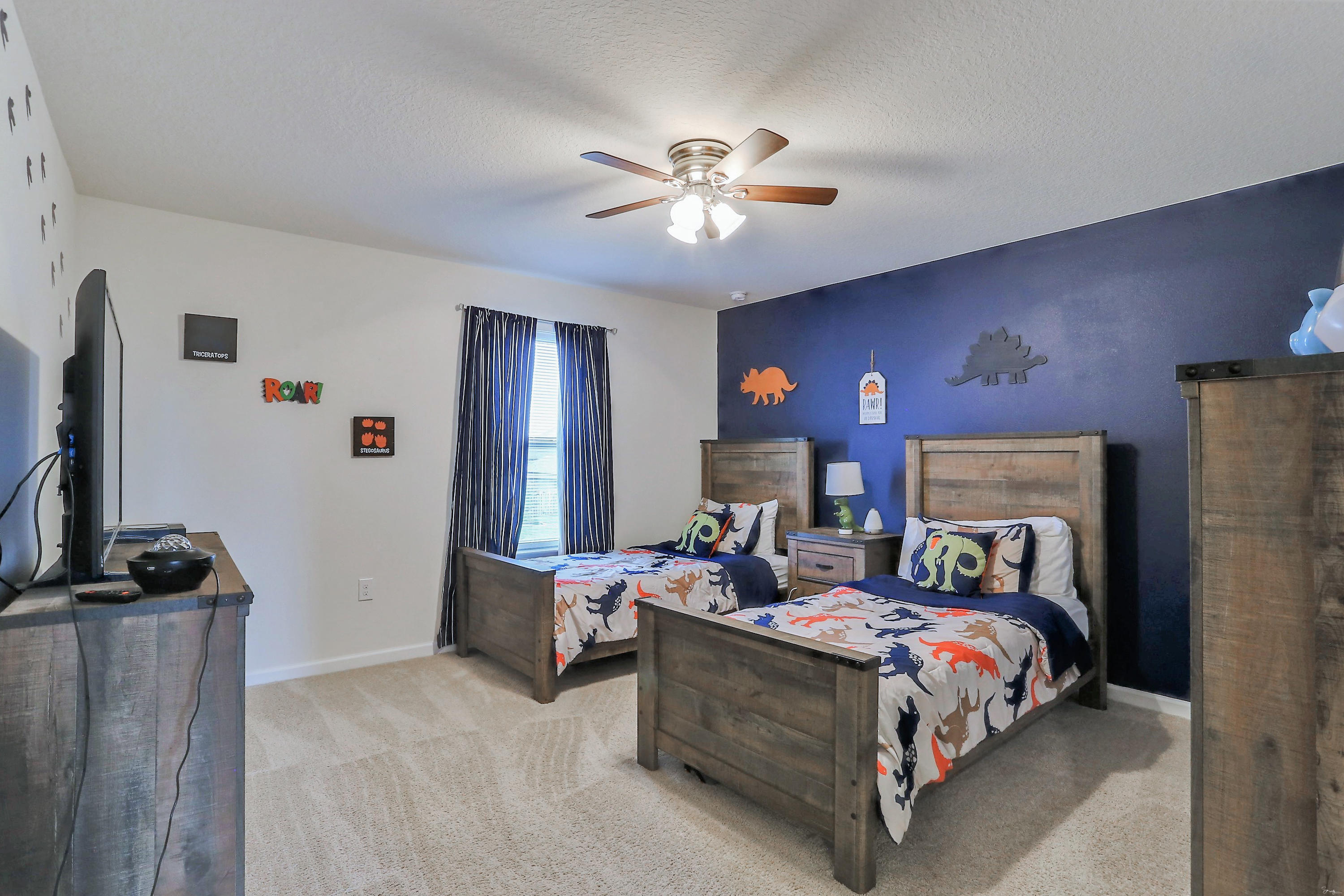 358 Merlin Court Crestview, FL 32539 - Photo 37 of 45 a bedroom with a bed couch and a window