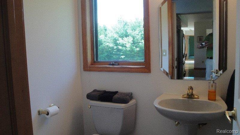 2210 West Brocker Road Metamora, MI 48455 - Photo 24 of 32 Extra Half Bath.jpg