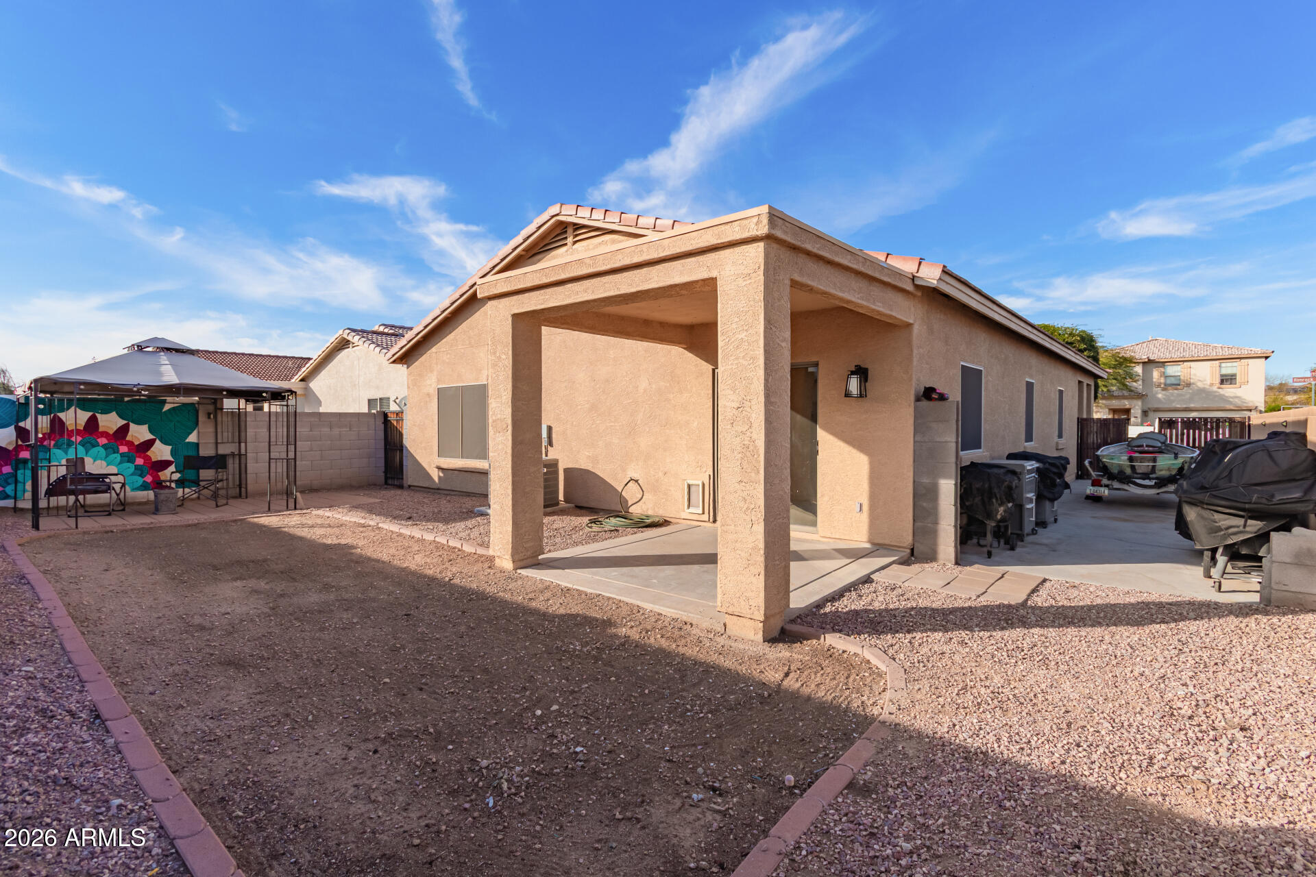 16805 West Rimrock Street Surprise, AZ 85388 - Photo 29 of 42 a view of a house with a patio