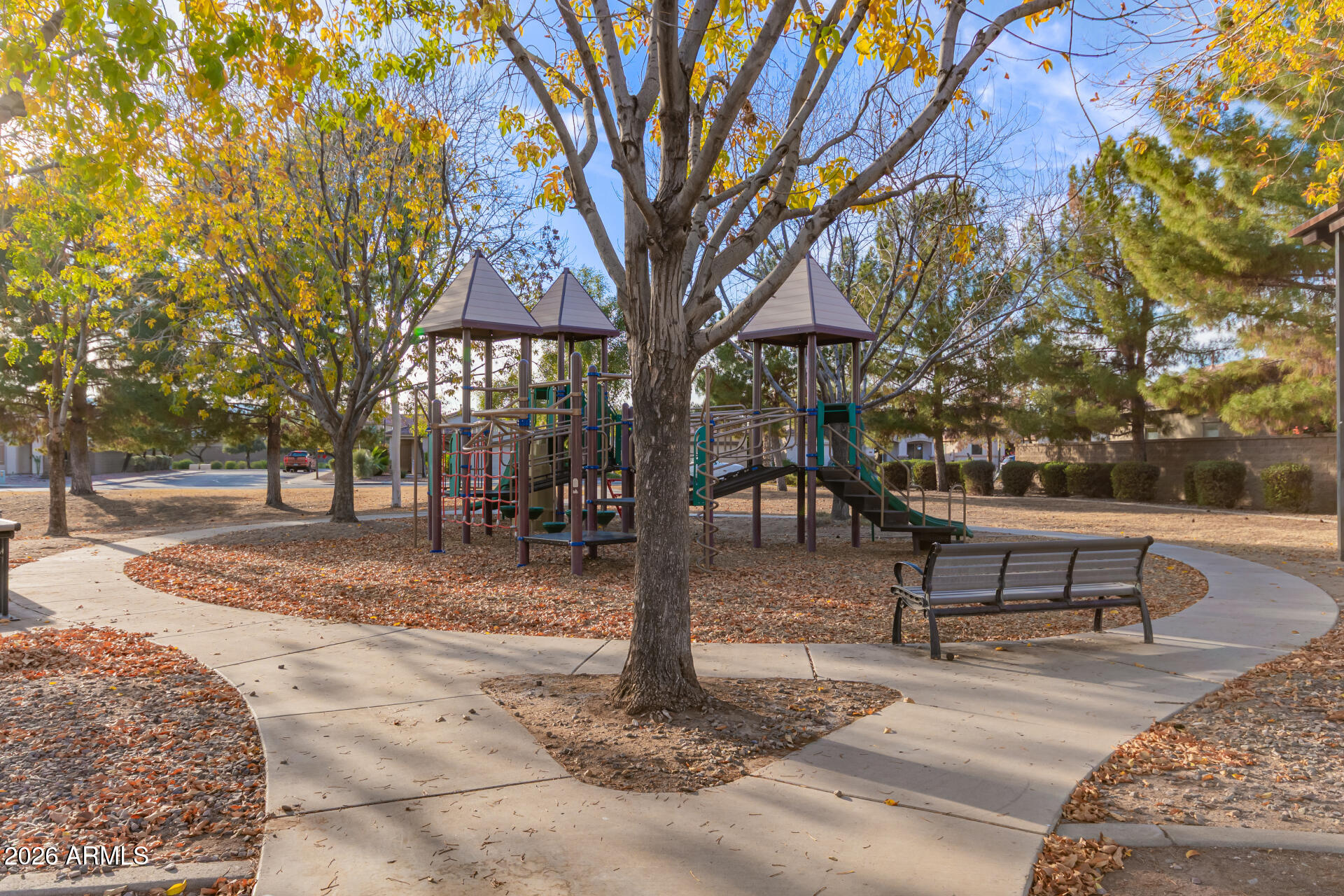 16805 West Rimrock Street Surprise, AZ 85388 - Photo 38 of 42 a view of a park with bench and trees