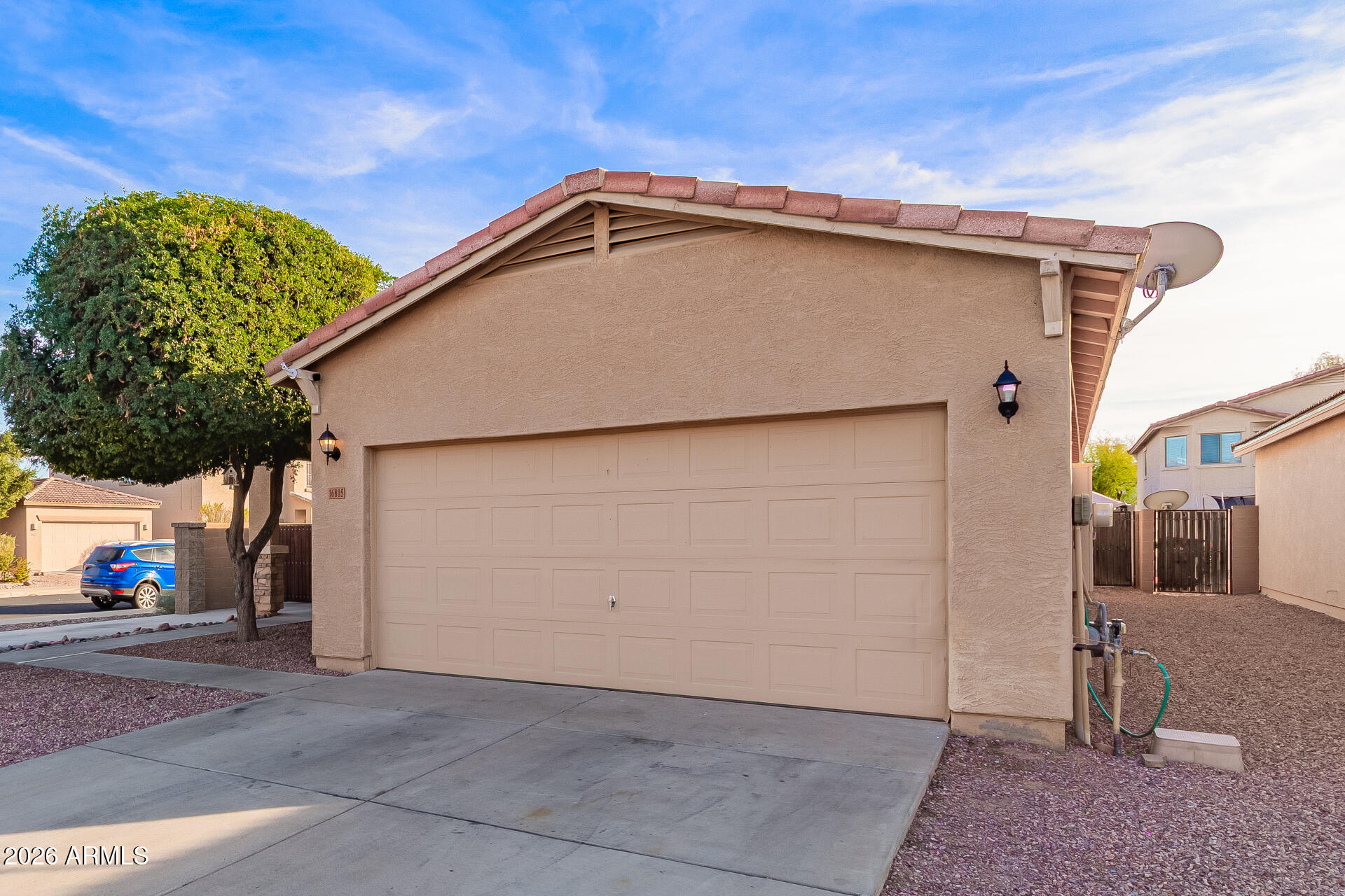 16805 West Rimrock Street Surprise, AZ 85388 - Photo 5 of 42 a view of a house with a street