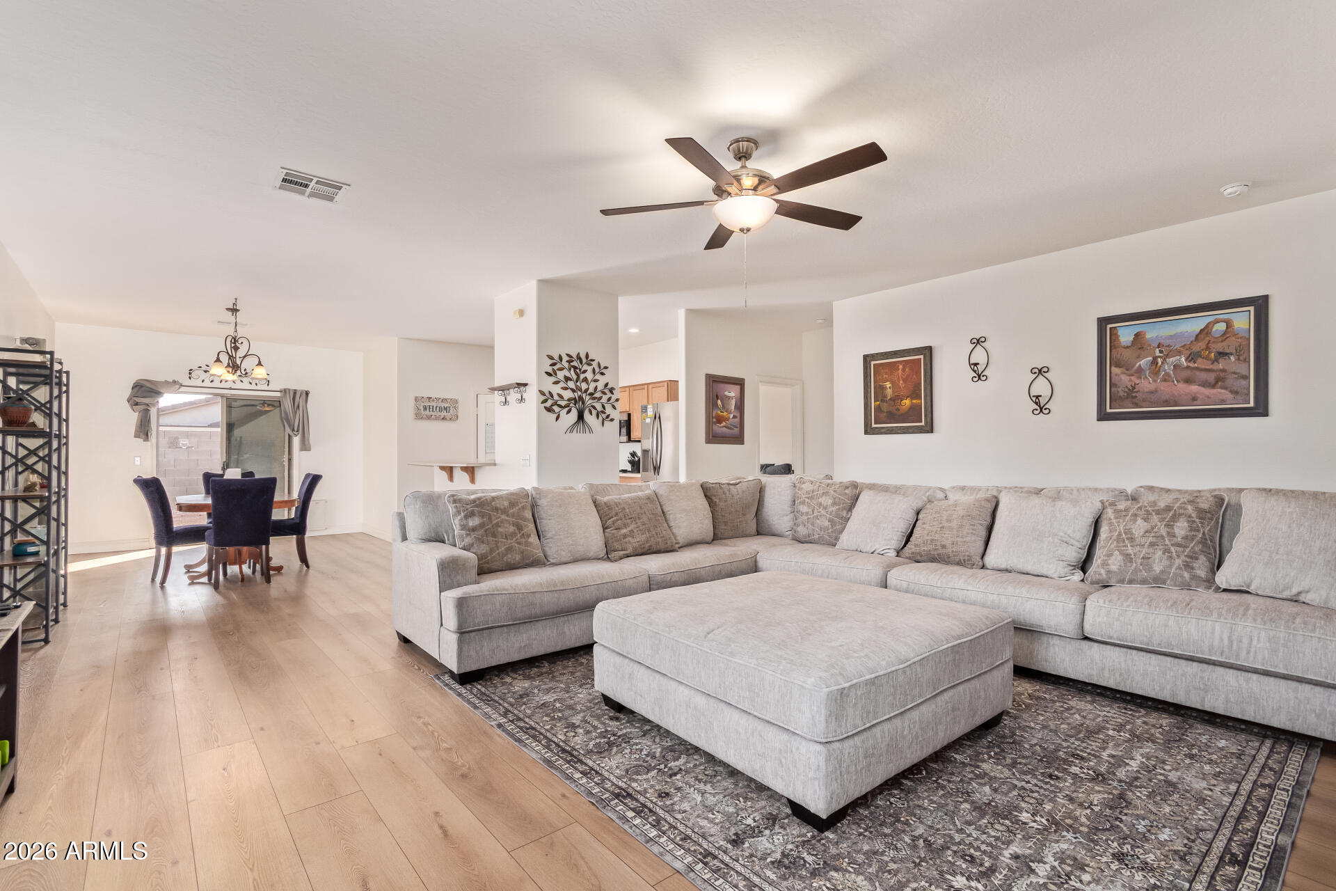 16805 West Rimrock Street Surprise, AZ 85388 - Photo 7 of 42 a living room with furniture and a large window