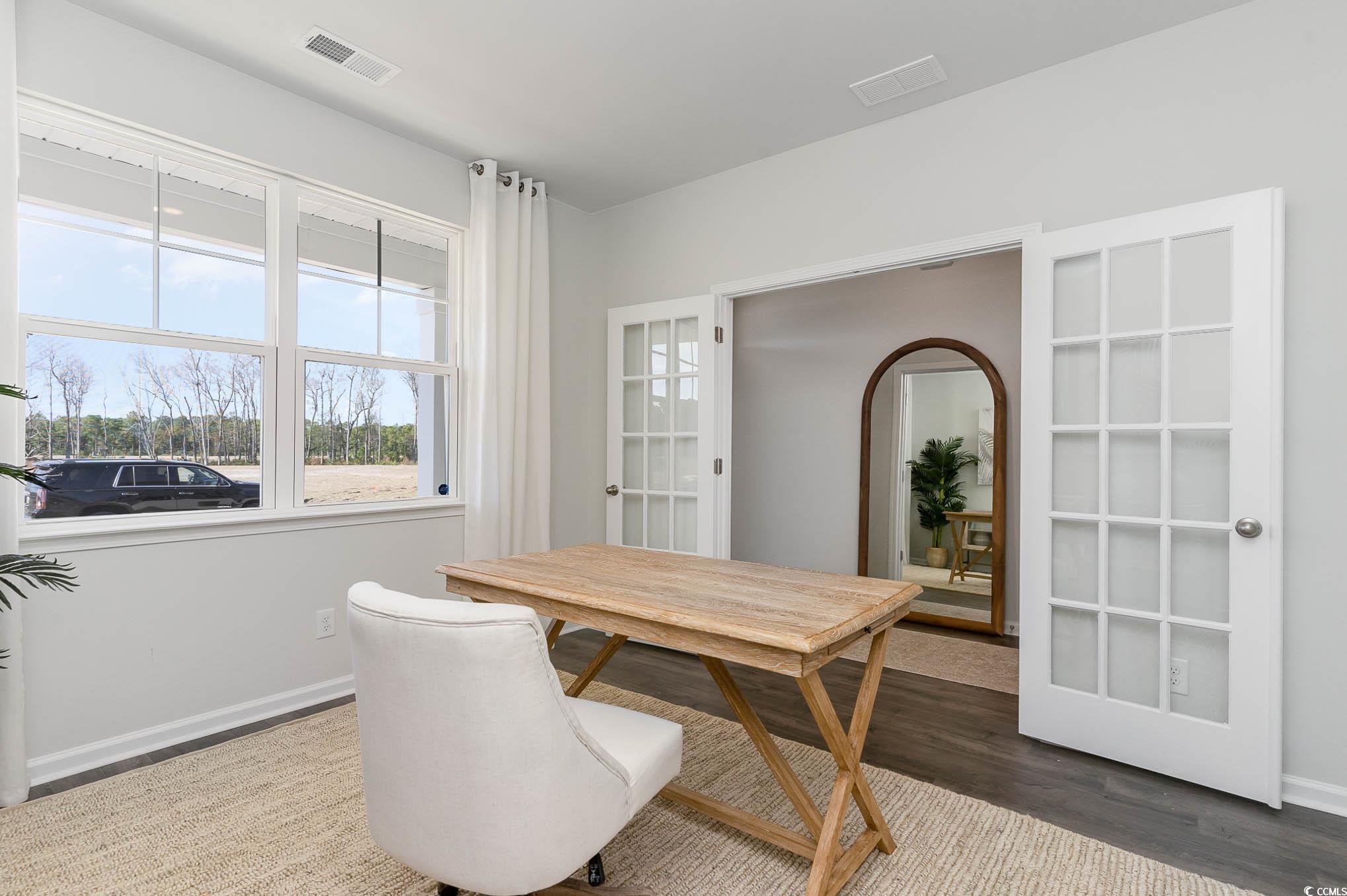 348 Rookroost Circle Conway, SC 29526 - Photo 5 of 27 Dining room featuring dark hardwood / wood-style f