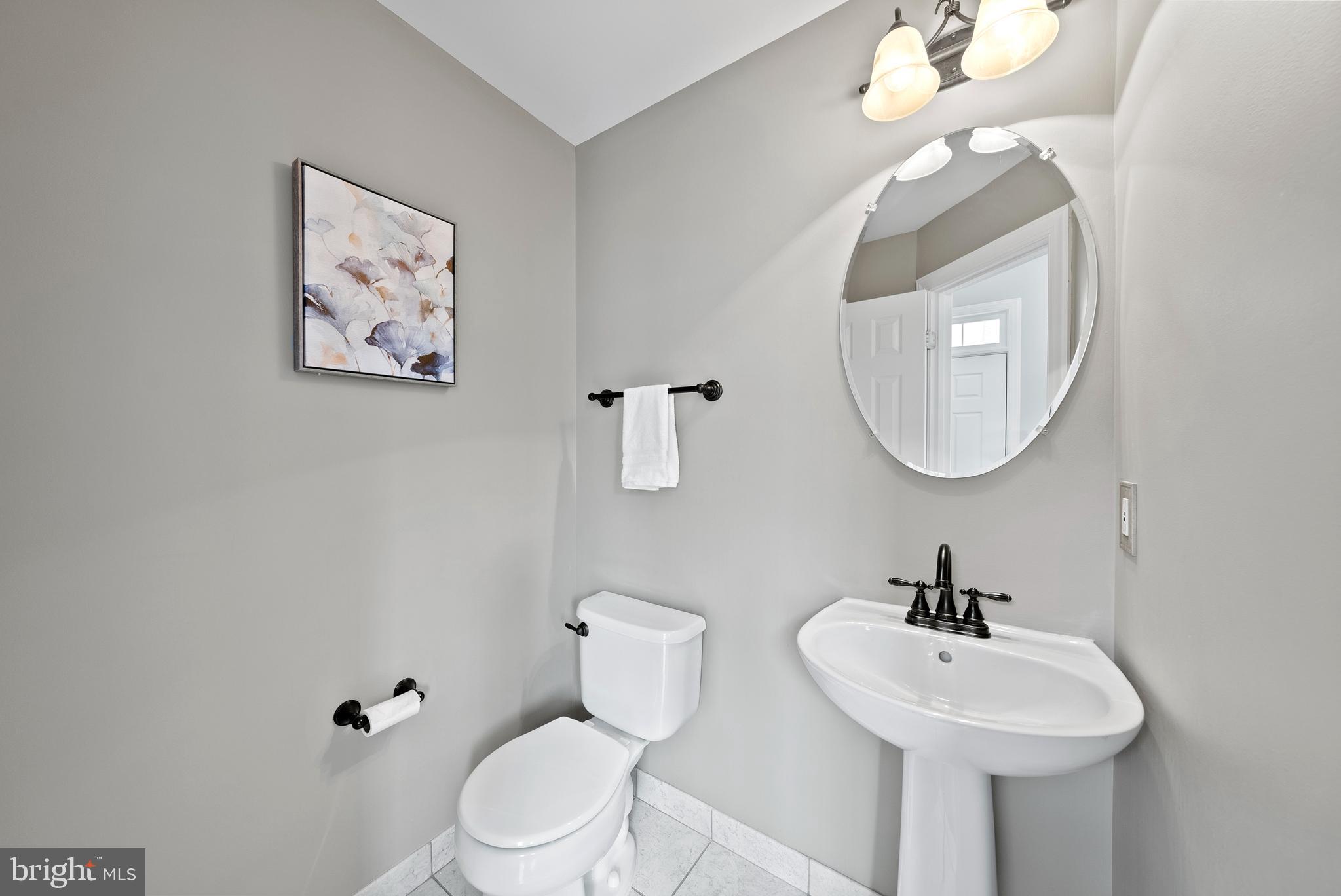 134 Roland Court Southwest Vienna, VA 22180 - Photo 9 of 31 Clean & minimalist powder room