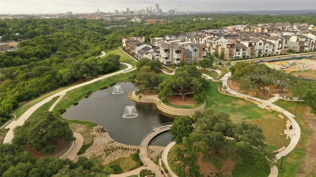 an aerial view of a house with outdoor space