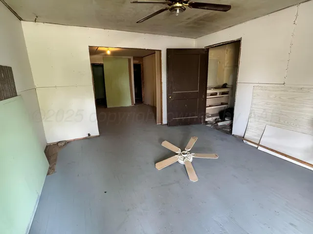 a view of a livingroom with a staircase